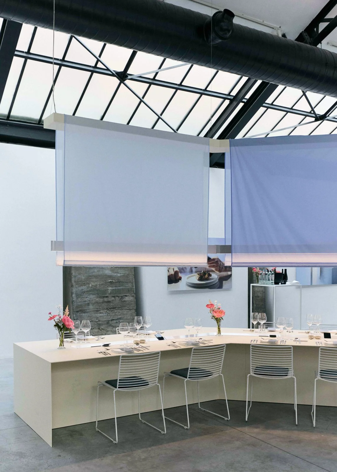 Minimalist fine dining set design with custom tables and lighting reflecting 5.8mm ultra-thin concept