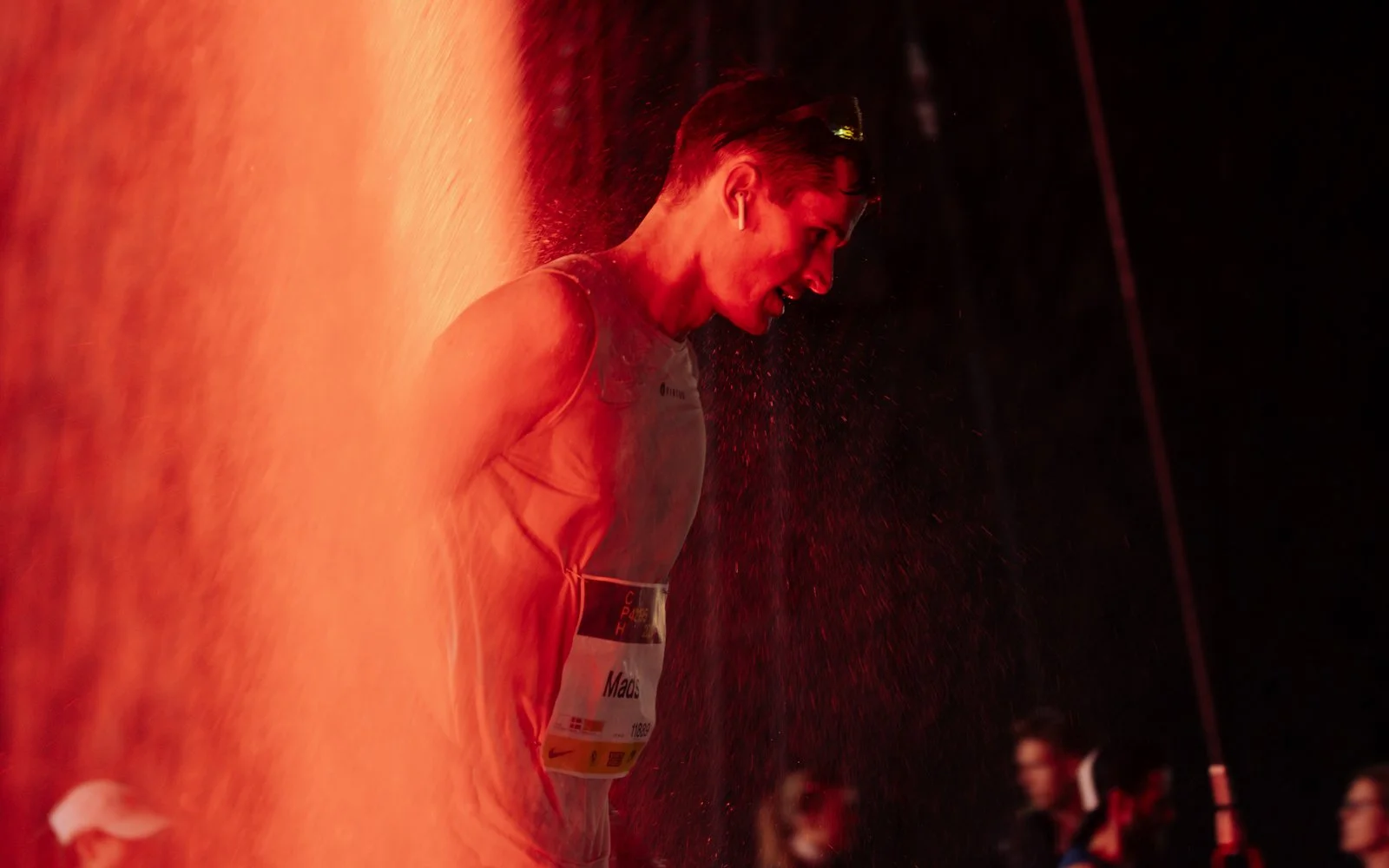Interactive race route activation with 6-meter water curtain and integrated lighting for Nike brand experience