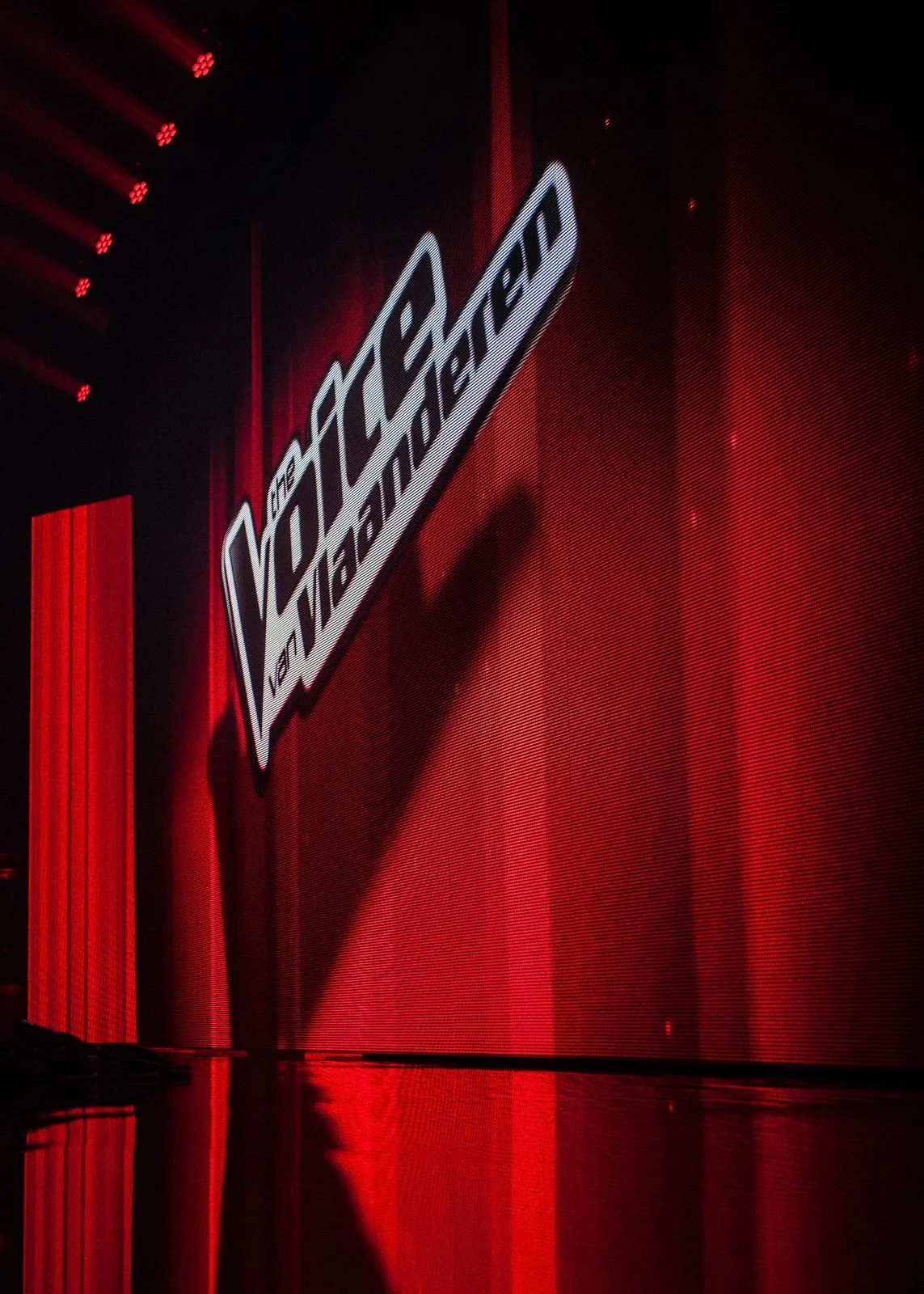 Custom-built TV studio environment with integrated lighting system and camera logic for live music performances