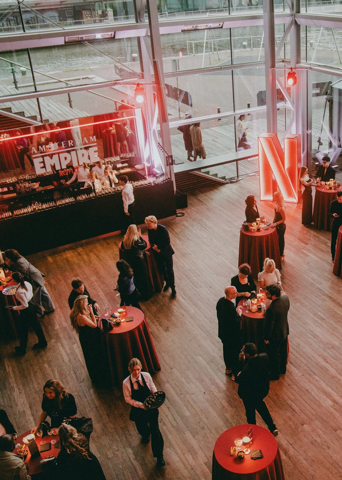 Scenic build with velvet finishes and premium red carpet environment