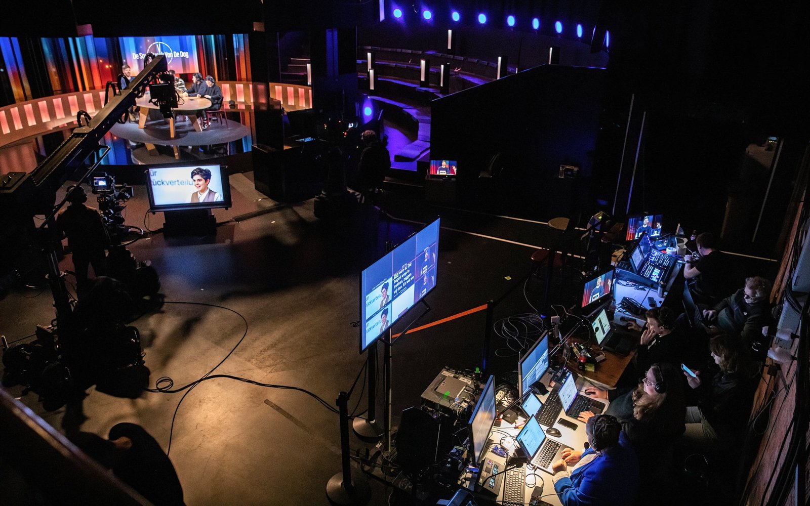 Custom talk show decor with 24-hour dial inspired circular frieze