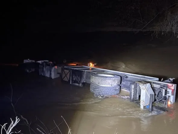 Accident I-20 westbound near MM 149 near the airport. Vehicle submerged in water. Occupants walked back to Queen City Truck Stop