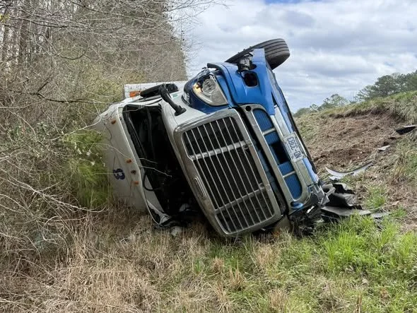 18-Wheeler rollover westbound at MM 163 on I-20. Another rig involved, roadway is open use caution.