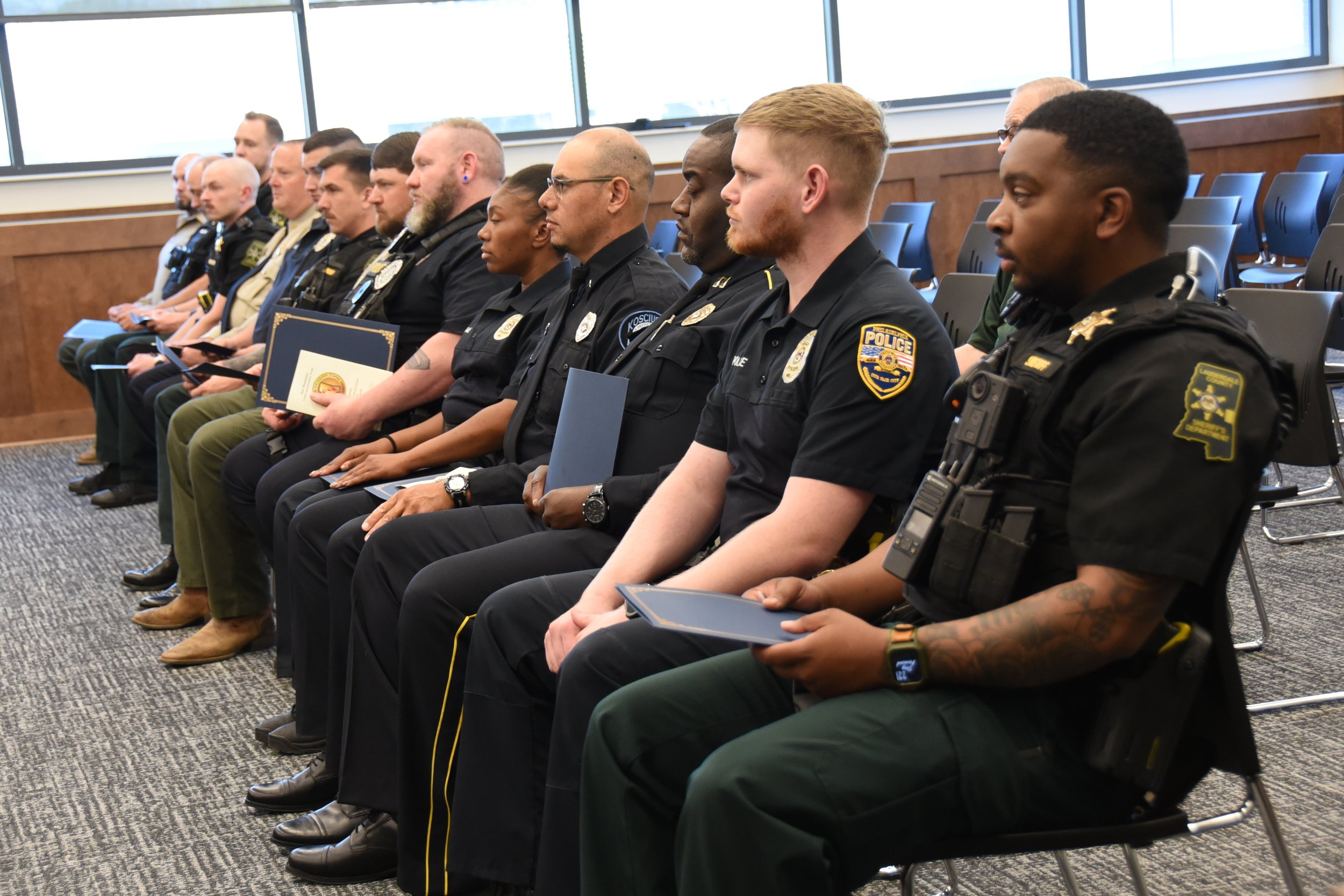 Law enforcement graduate from Crisis Intervention training