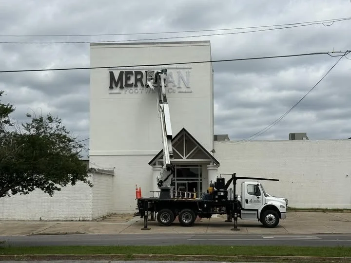 New sign going up at Meridian Footwear on 22nd Ave.