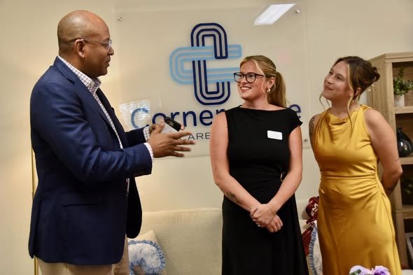 Community welcomes Cornerstone Caregiving with ribbon cutting