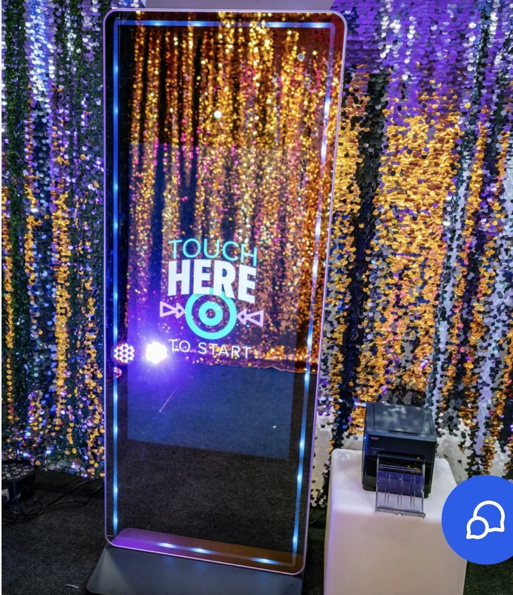 The mirror photobooth is an interactive and innovative photo-taking experience that combines cutting-edge technology with an elegant design. Featuring a full-length mirror, this booth allows guests to see themselves before capturing photos. 