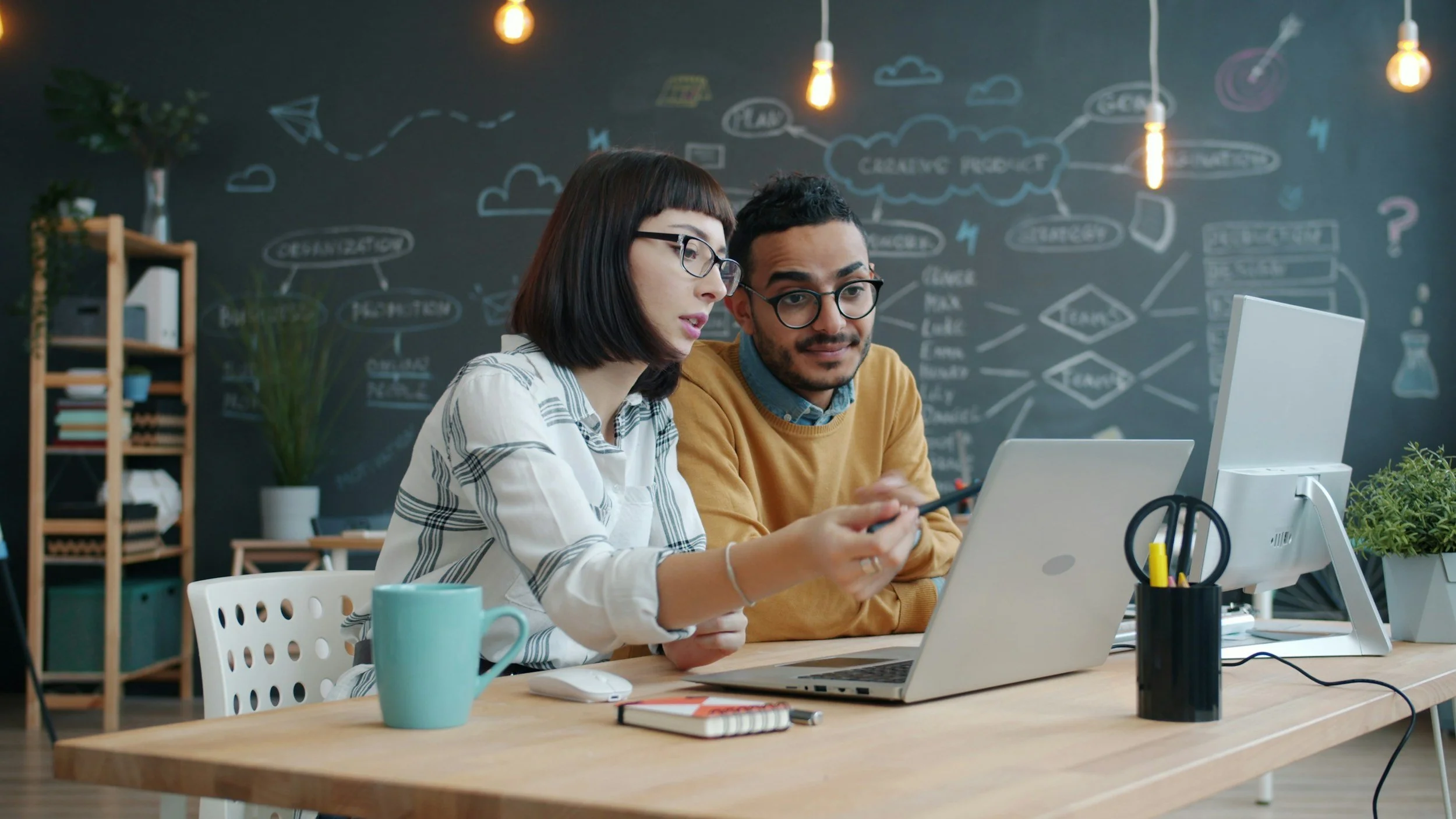 A couple, a woman and a man, learning about how to create a 'what if I die' plan for business, Your Business Executor, Hamilton, Ontario, Canada