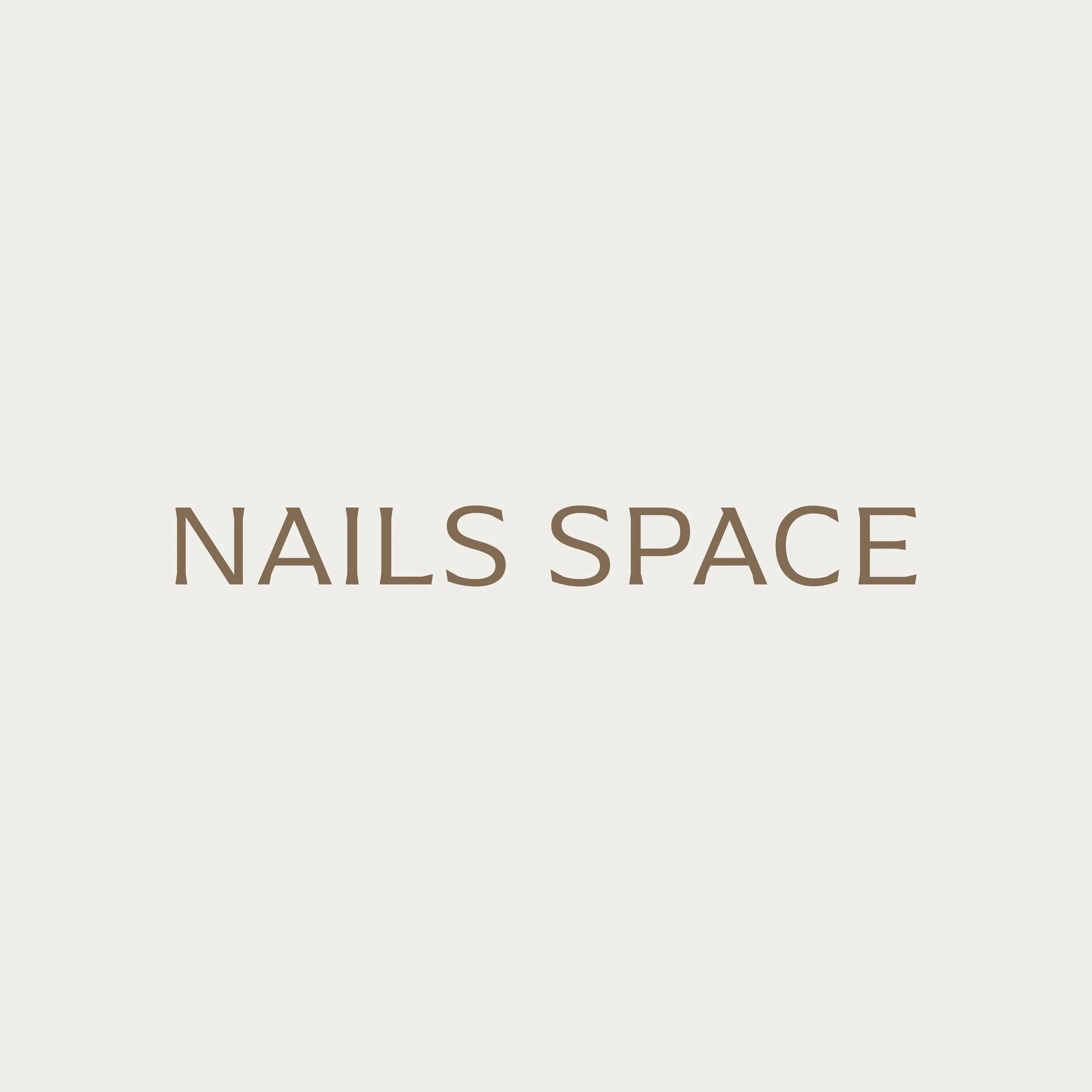 Part of a logo with the text 'NAIL SPACE' in brown letters.