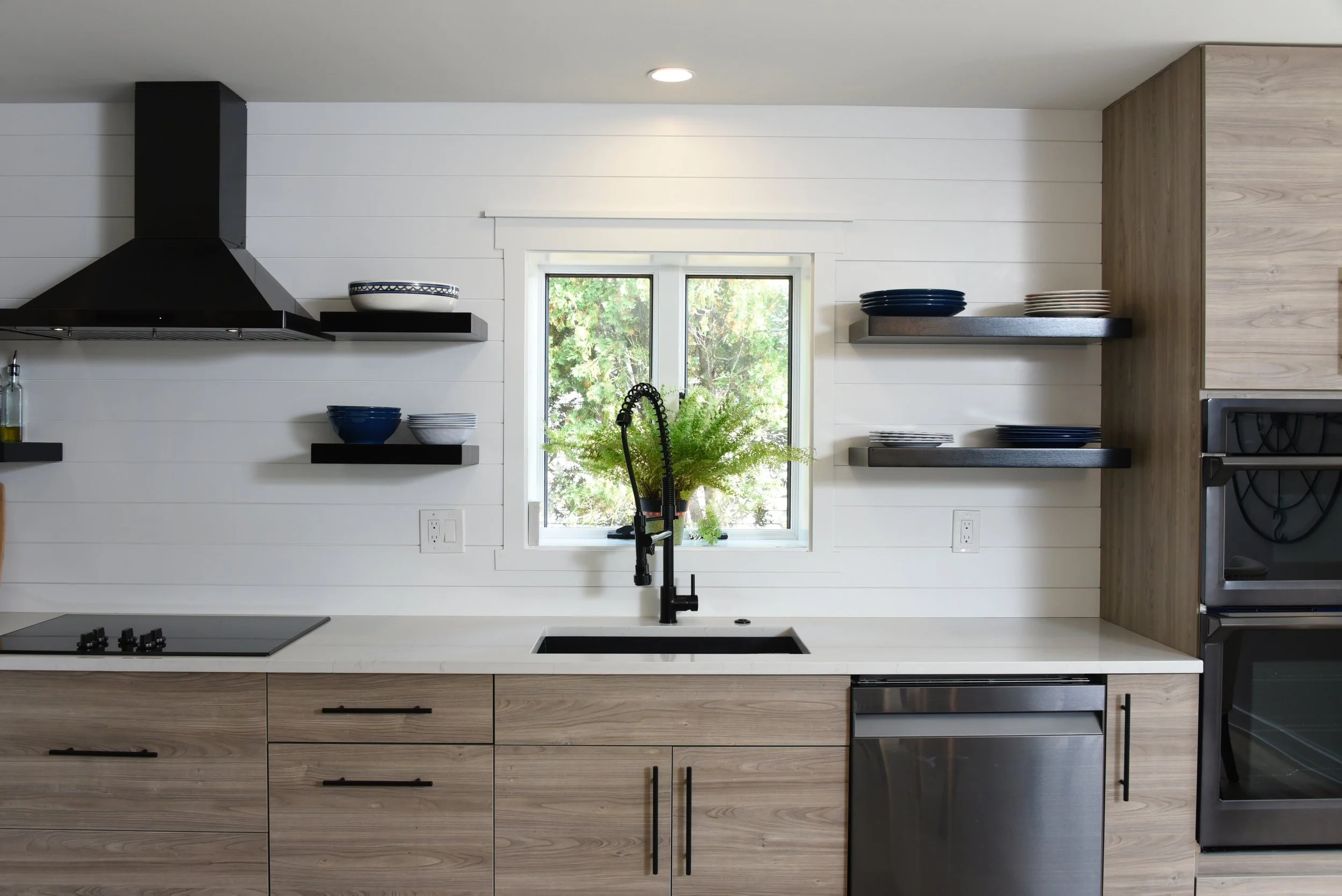 Modern Coastal Outdoor Kitchen Remodel by Ram Construction — Project 1 project photo