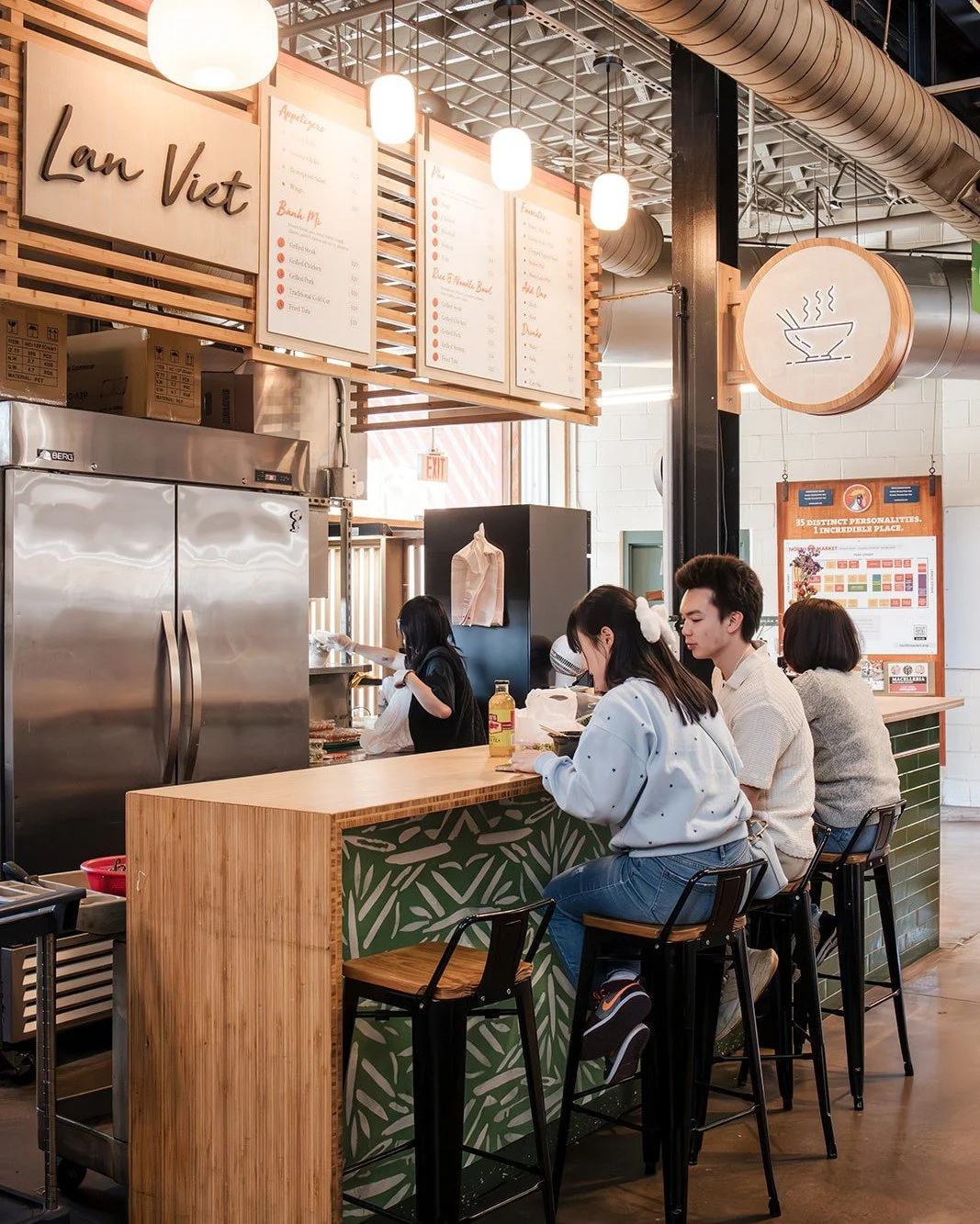 A facelift for Lan Viet, including new dining counter, menu boards, lighting, and signage. Swipe to see the 'before' #restaurantdesign @lanvietmarket_