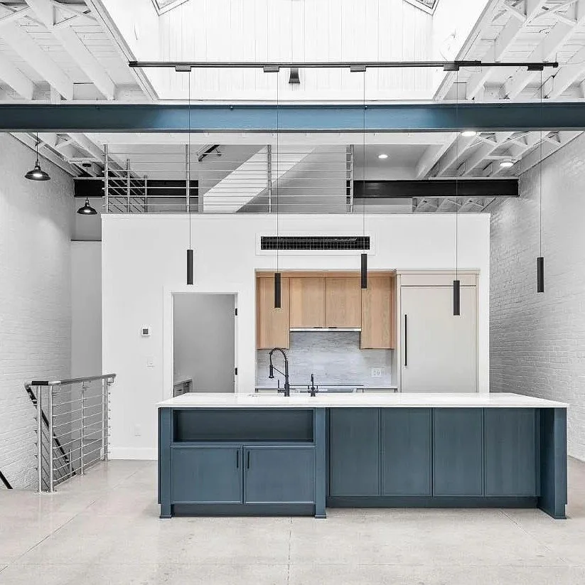 A polished but industrial kitchen space inside the adaptive reuse of a former ink factory in OTR. We kept the original blue steel and complimented it with custom cabinetry. Swipe to see our inspiration and mid-construction messiness.