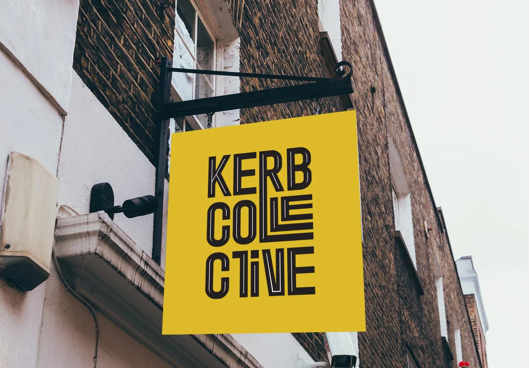 Kerb Collective Hanging Sign.jpg