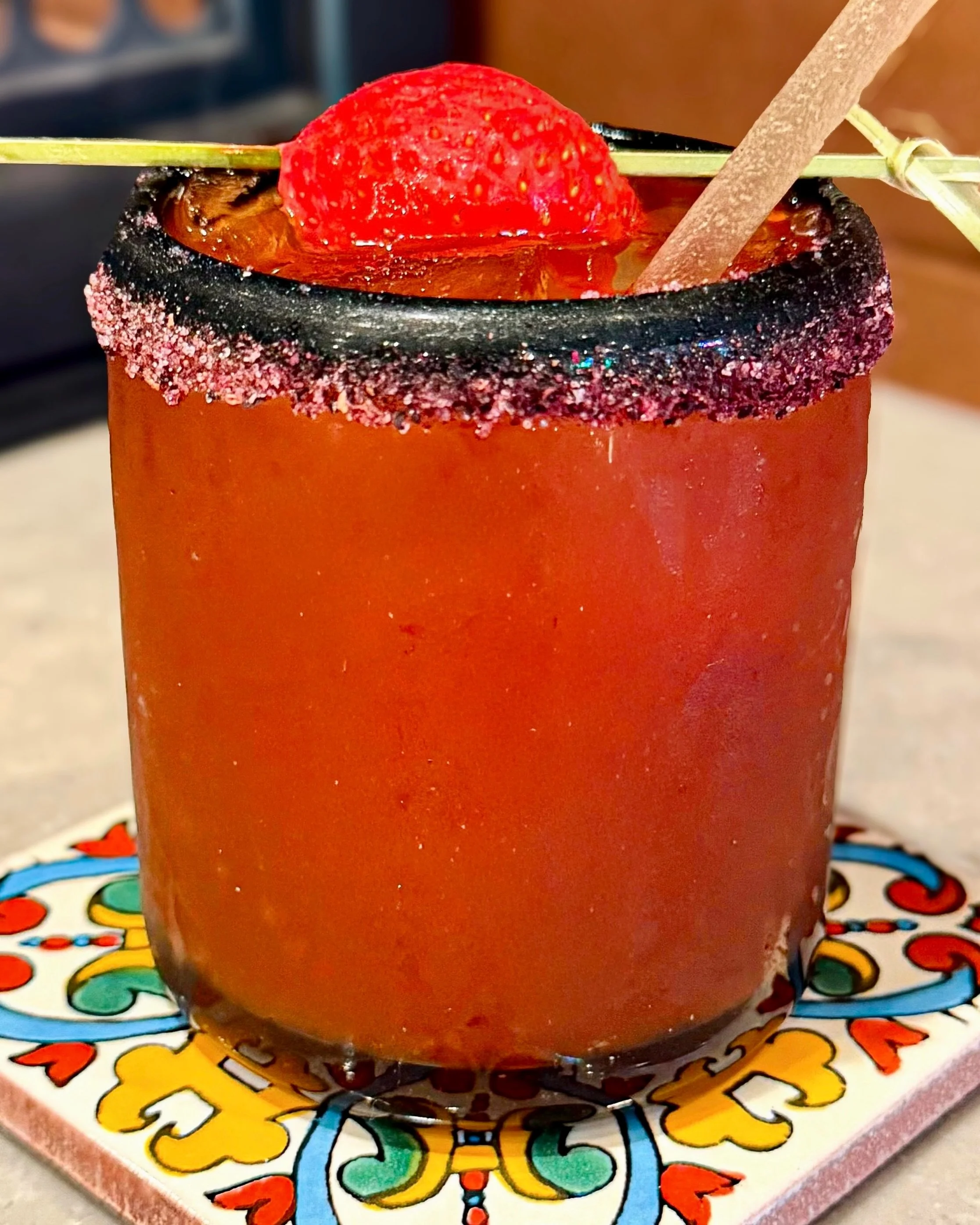 🍓🌶️ Have you tried our Margarita of the Month? Fresh strawberry, guajillo, and a little kick make this one hard to put down.