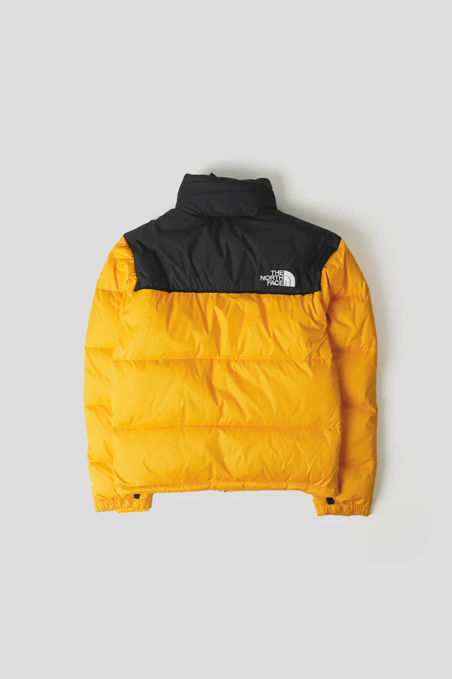THE-NORTH-FACE-VESTE-NUPTSE-1996-SUMMIT-GOLD-ET-TNF-BLACK-2.webp