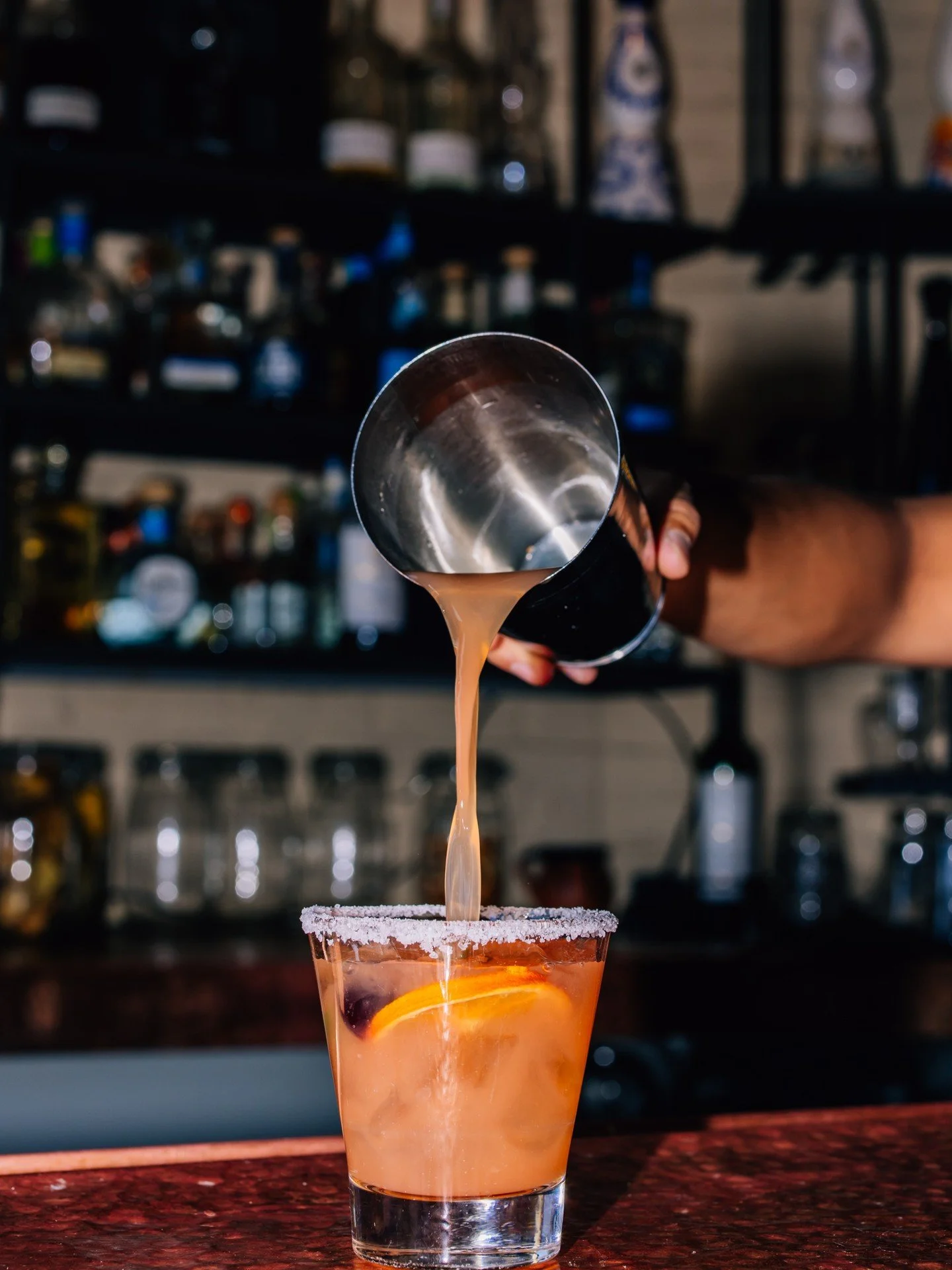 Golden hour in a glass 🍊✨ Fresh pours, bold flavors, and that perfect salted rim&mdash;margaritas done right at 89Agave. 🍹