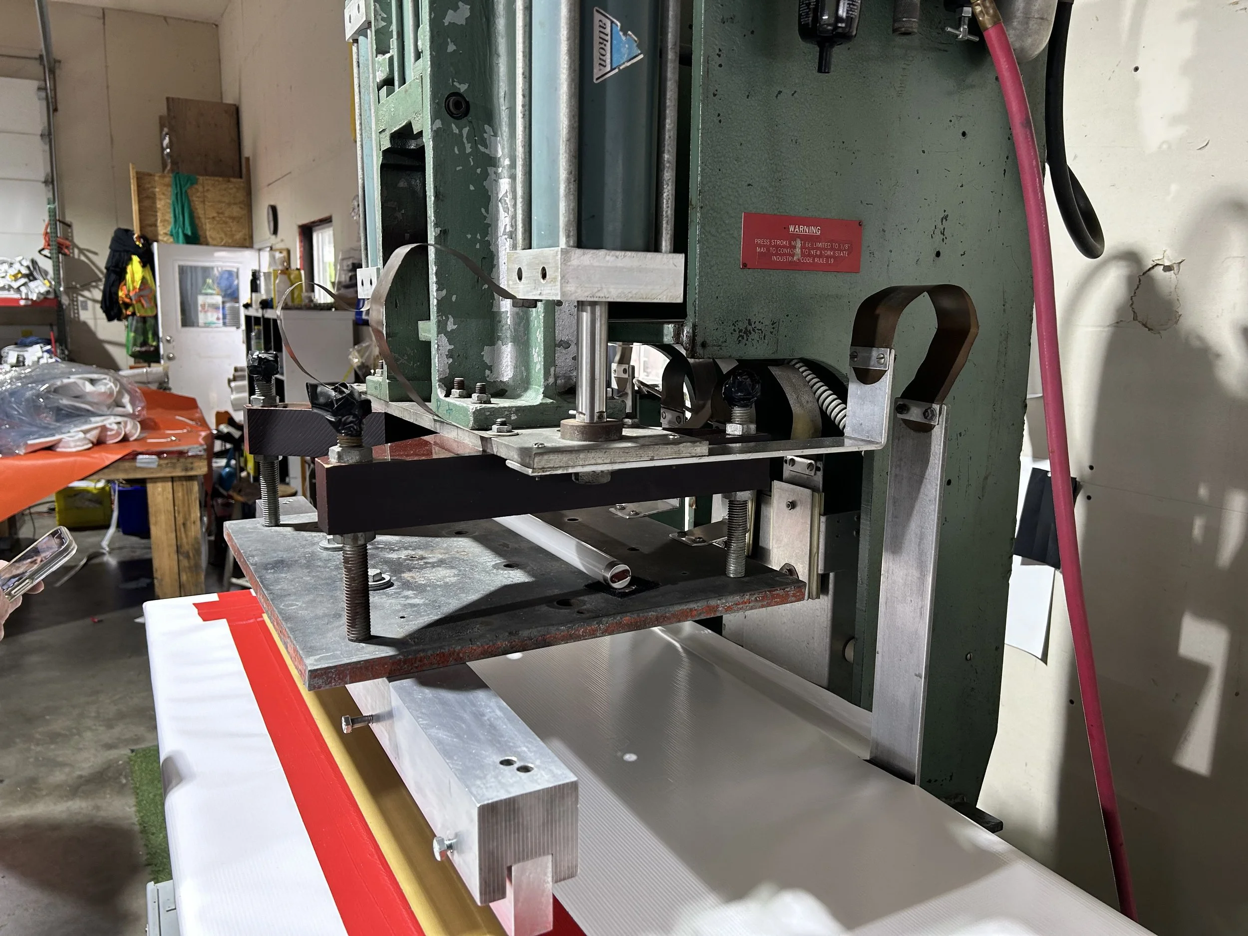 Side view of an RF welder press.