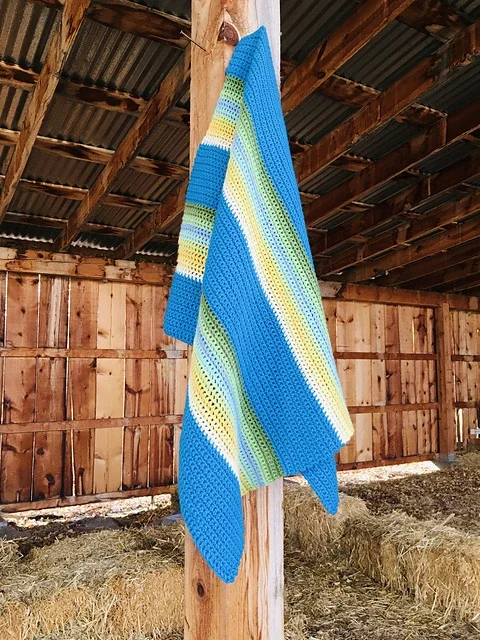 Modern_Southwestern_Blanket_on_nail_in_barn_medium2.webp