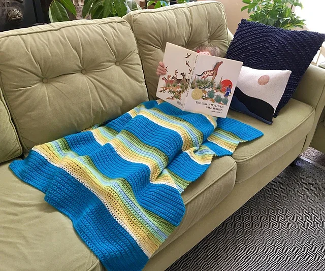 Modern_Southwestern_Blanket_modeled_by_Luke_medium2.webp