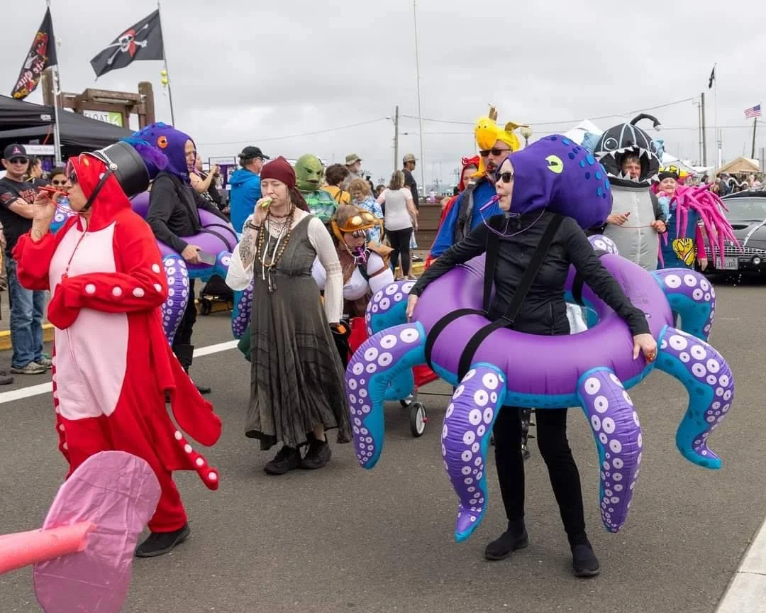 colorful costumes of octopi in the pirate daze parade