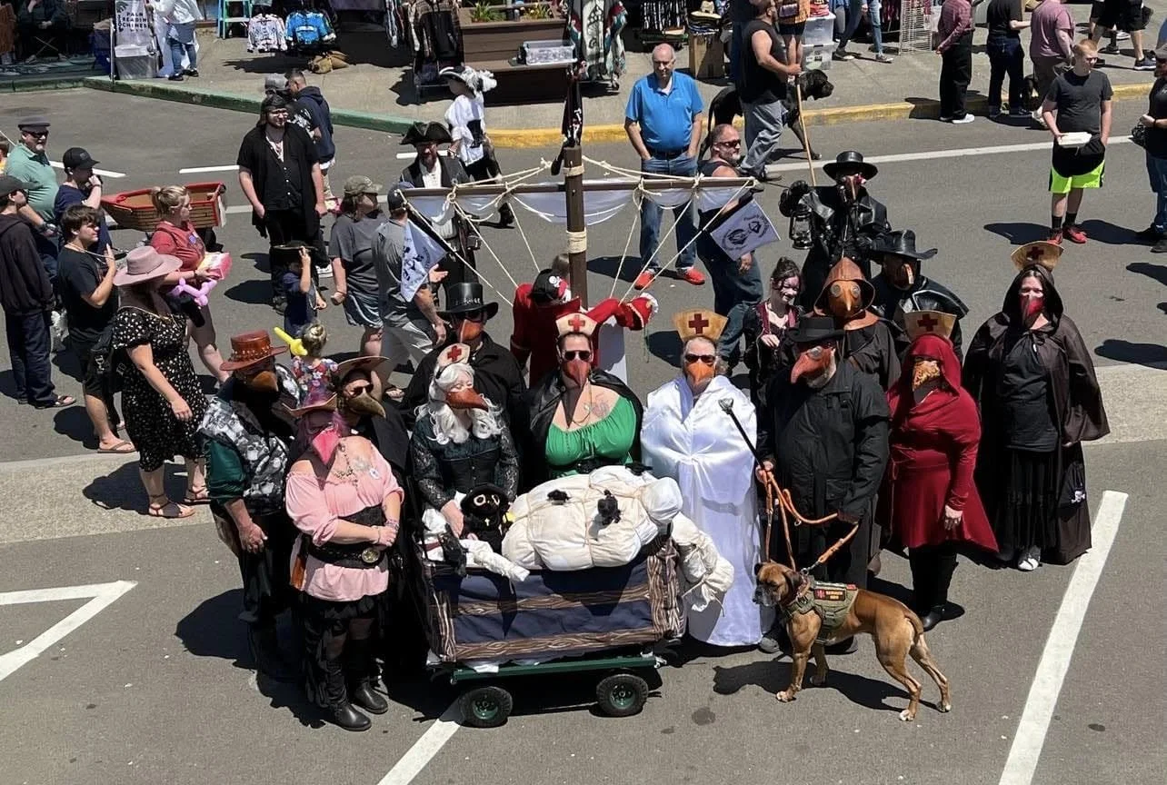 the whole group of porch pirates posed for a group photo below Sea birds candy and gifts