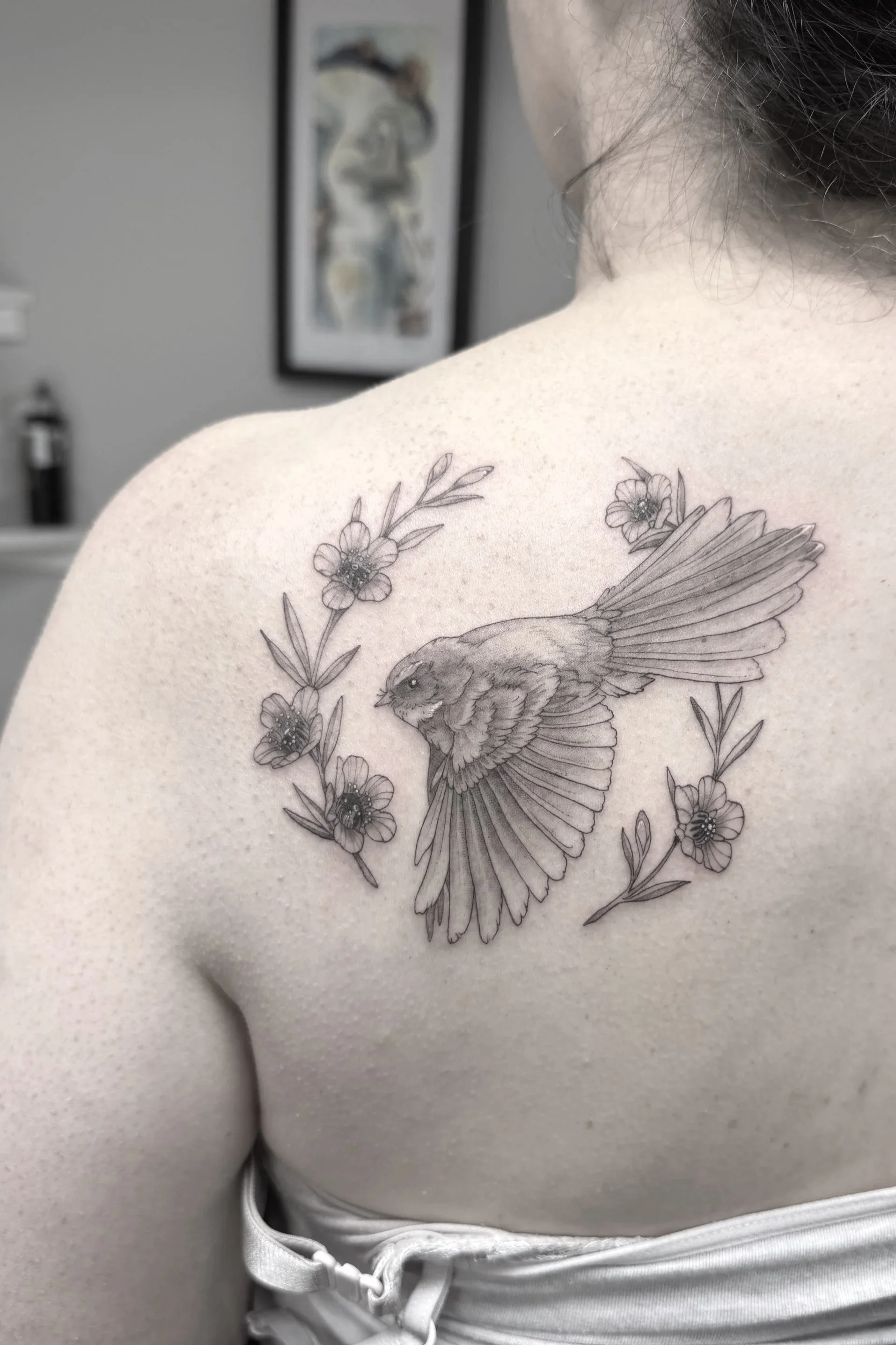 Fantail Manuka flowers New Zealand tat feminine female tattoo artist shoulder back