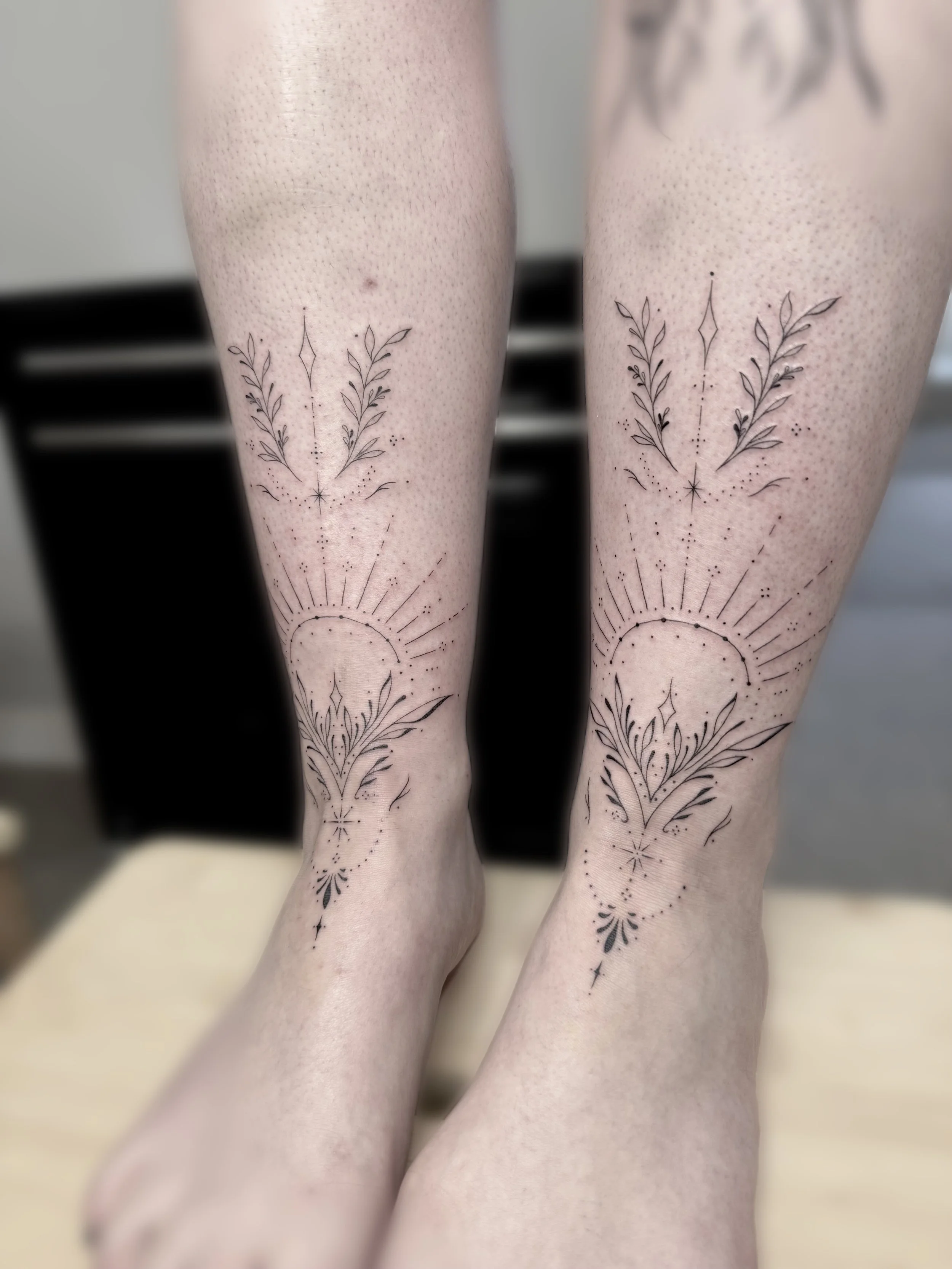 Ornamental tattoos feet legs matching fine detailed Queenstown 