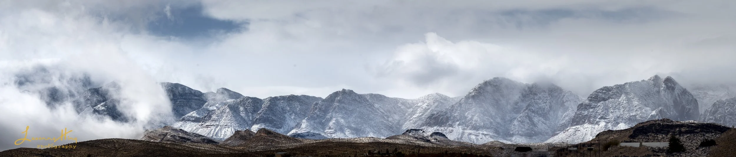 Desert Snow Curtain:  Spring Mountains, NV.  This is a 5 Photo Panorama taken of this breath taking Winter's morning in Southern Nevada.