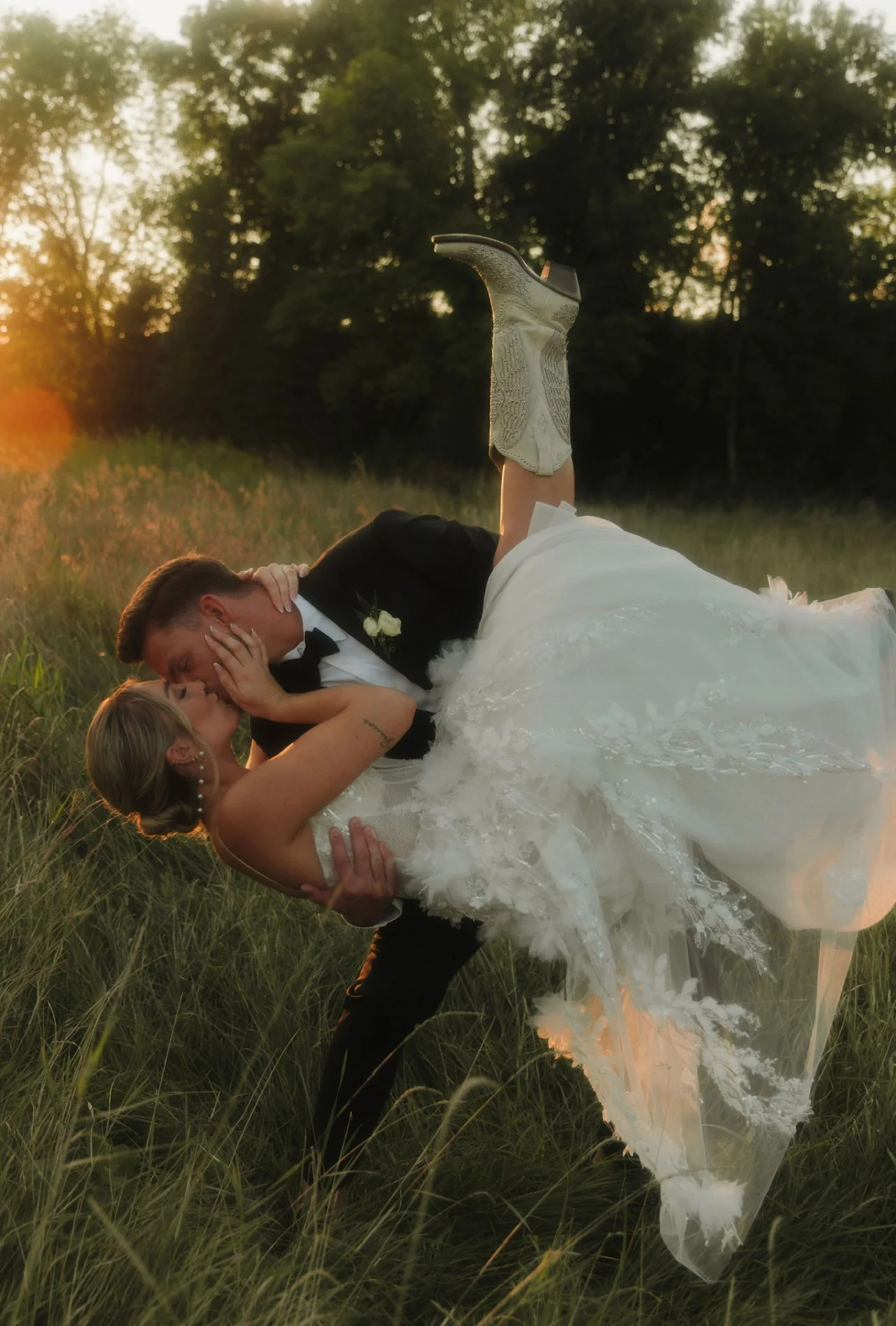 Laurie’s customers, Larissa and Emmett, just married walking off the aisle together.