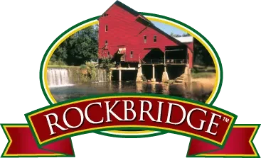 Rockbridge logo featuring a red mill near a waterfall with green trees in the background