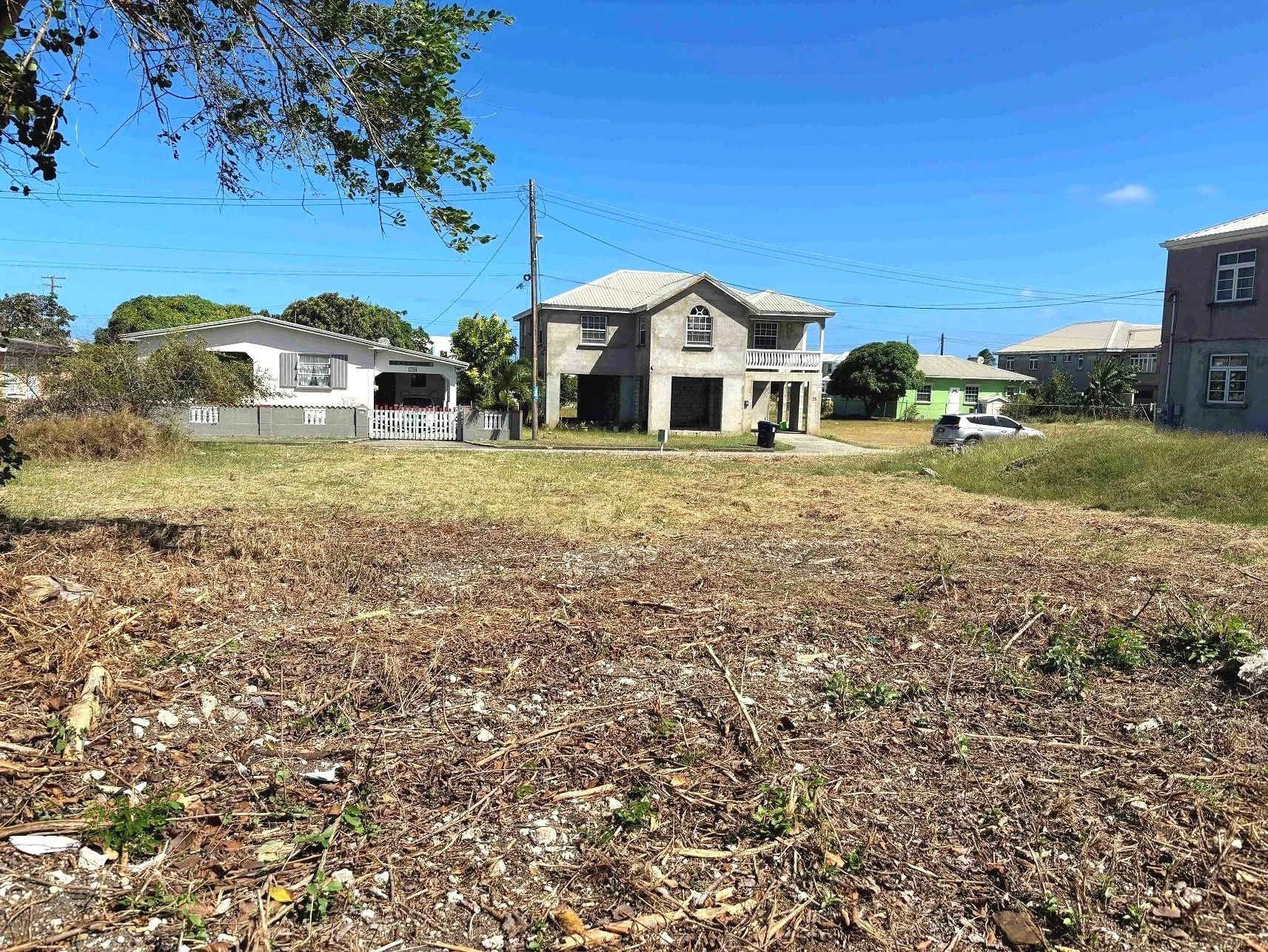 View from lot looking SE towards development road