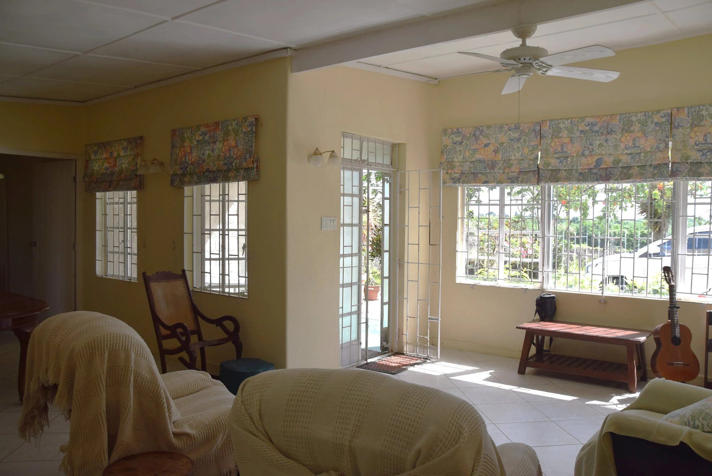 Living showing entrance and Eastern windows