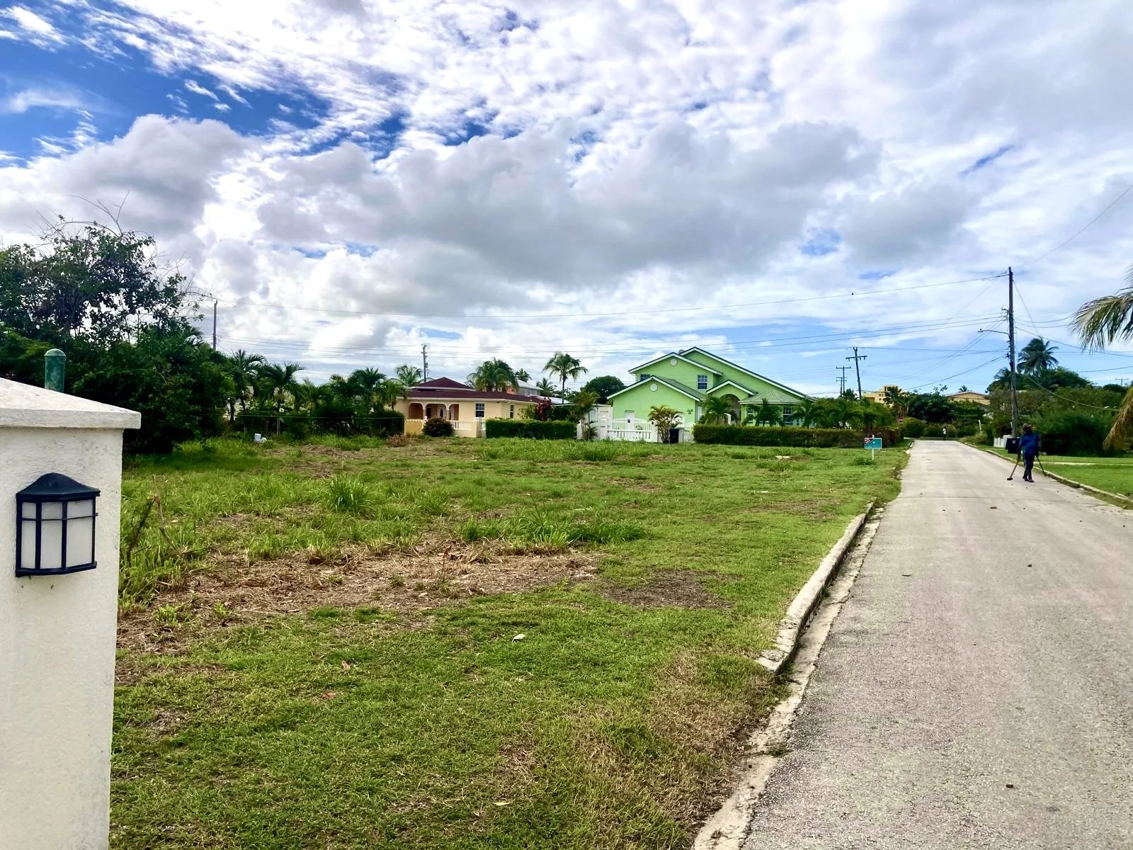Partial view of lot 68, looking NW along development road