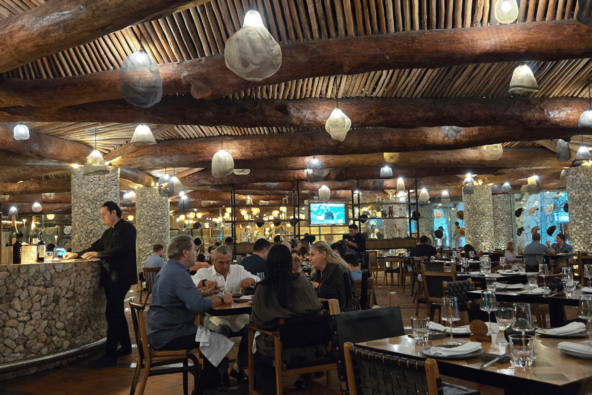 Upscale restaurant dining experience at Hotel Xcaret Mexico with modern design and full-service dining