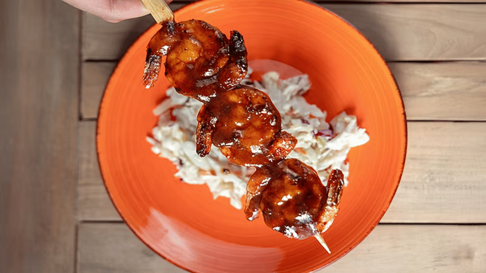 Grilled shrimp skewers served at Royal Beach Club Nassau beachside restaurant