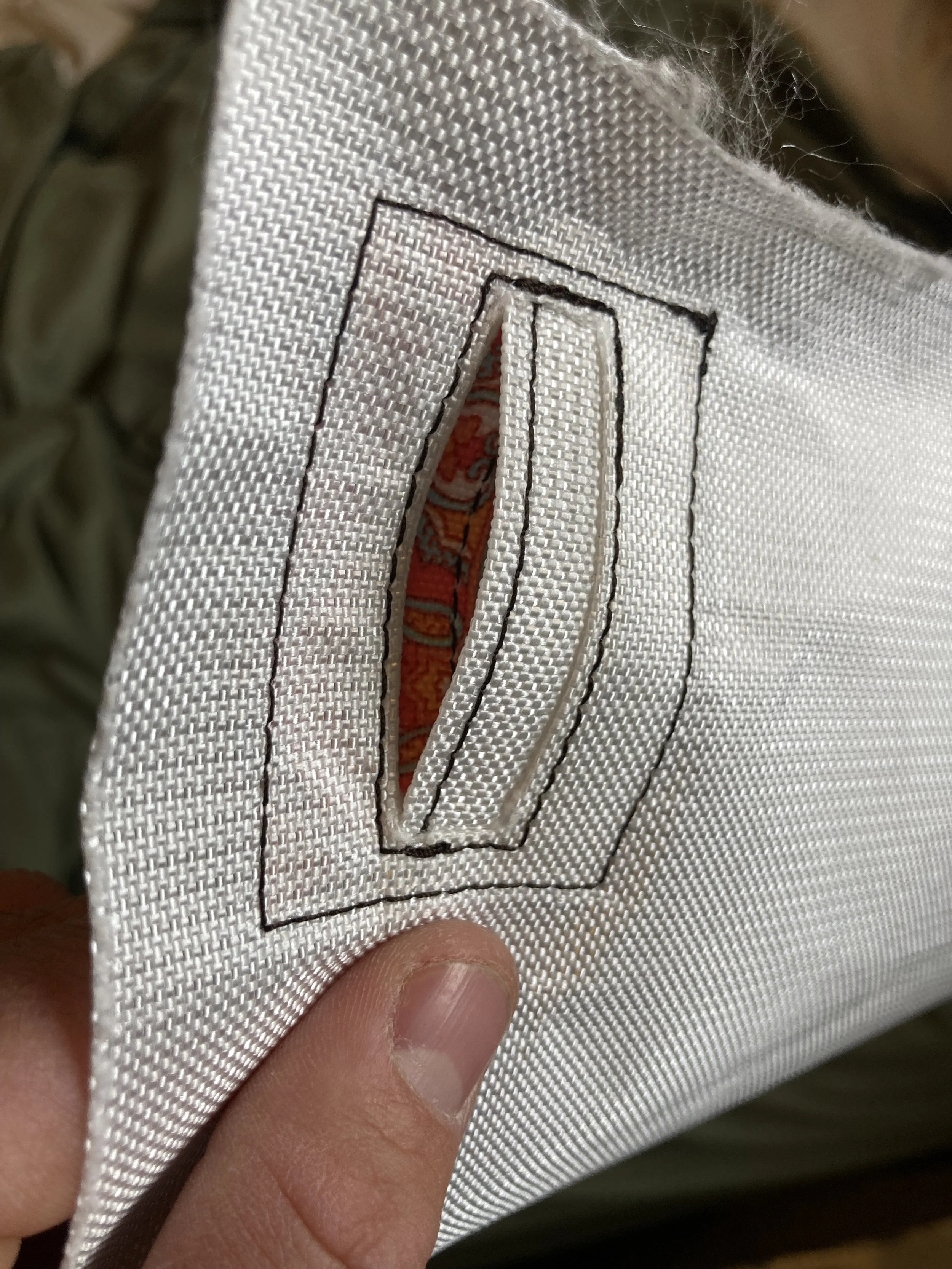 Hydration port for a water bladder hose or radio.