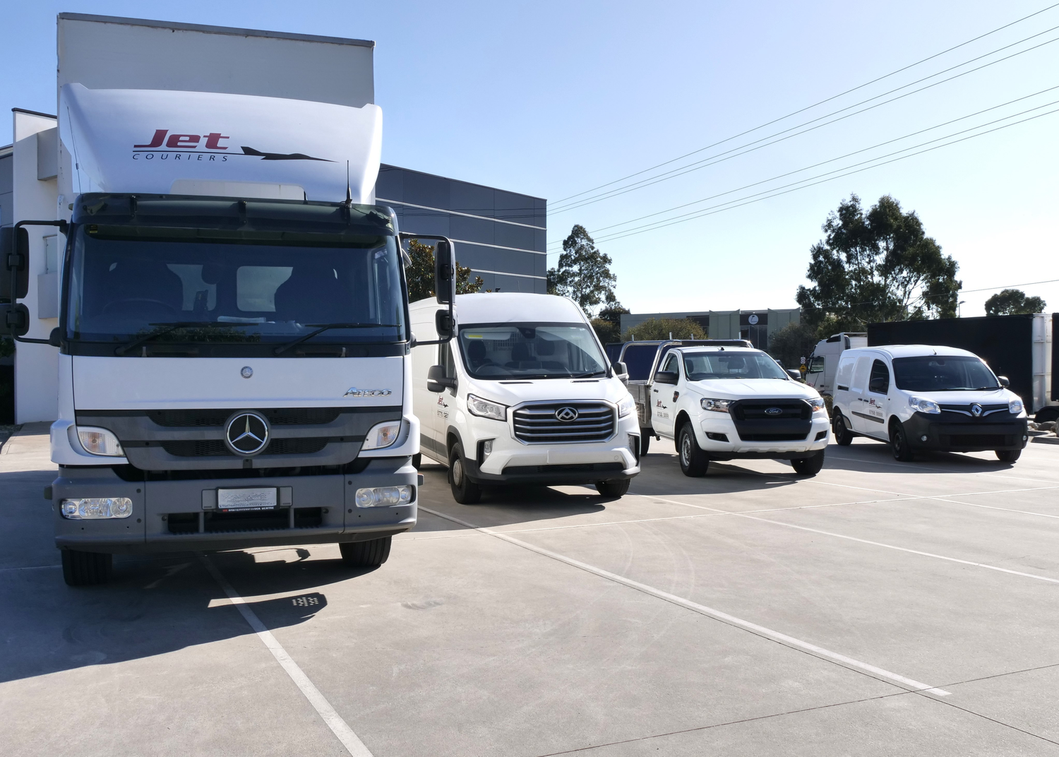 Jet Couriers Australian fleet of white courier vehicles