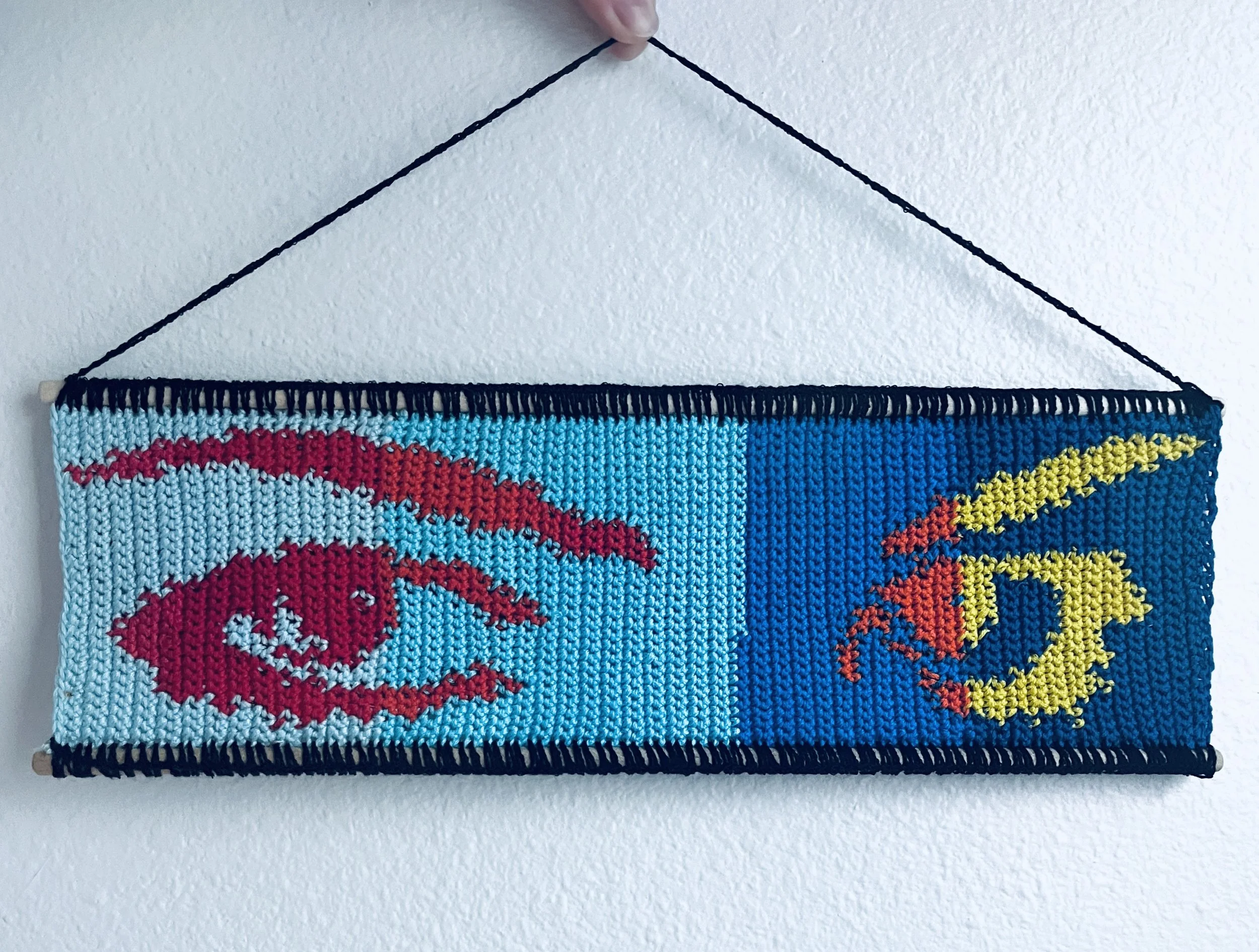 Eyes, 15 x 5", cotton thread, wooden dowels, felt, 2026