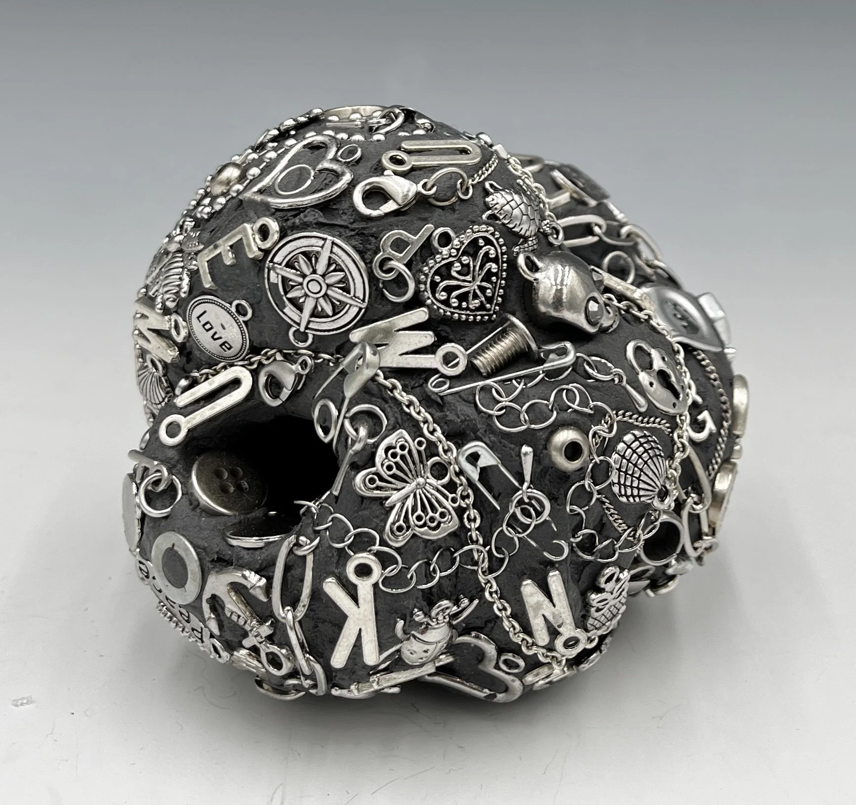 Glob #3, 3.5 x 4 x 3.5”, Ceramic, acrylic paint, found metal objects, 2025