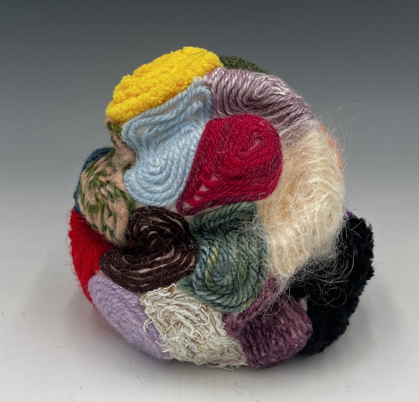 Glob #2, 4.25 x 4 x 4.25”, Ceramic and yarn, 2025