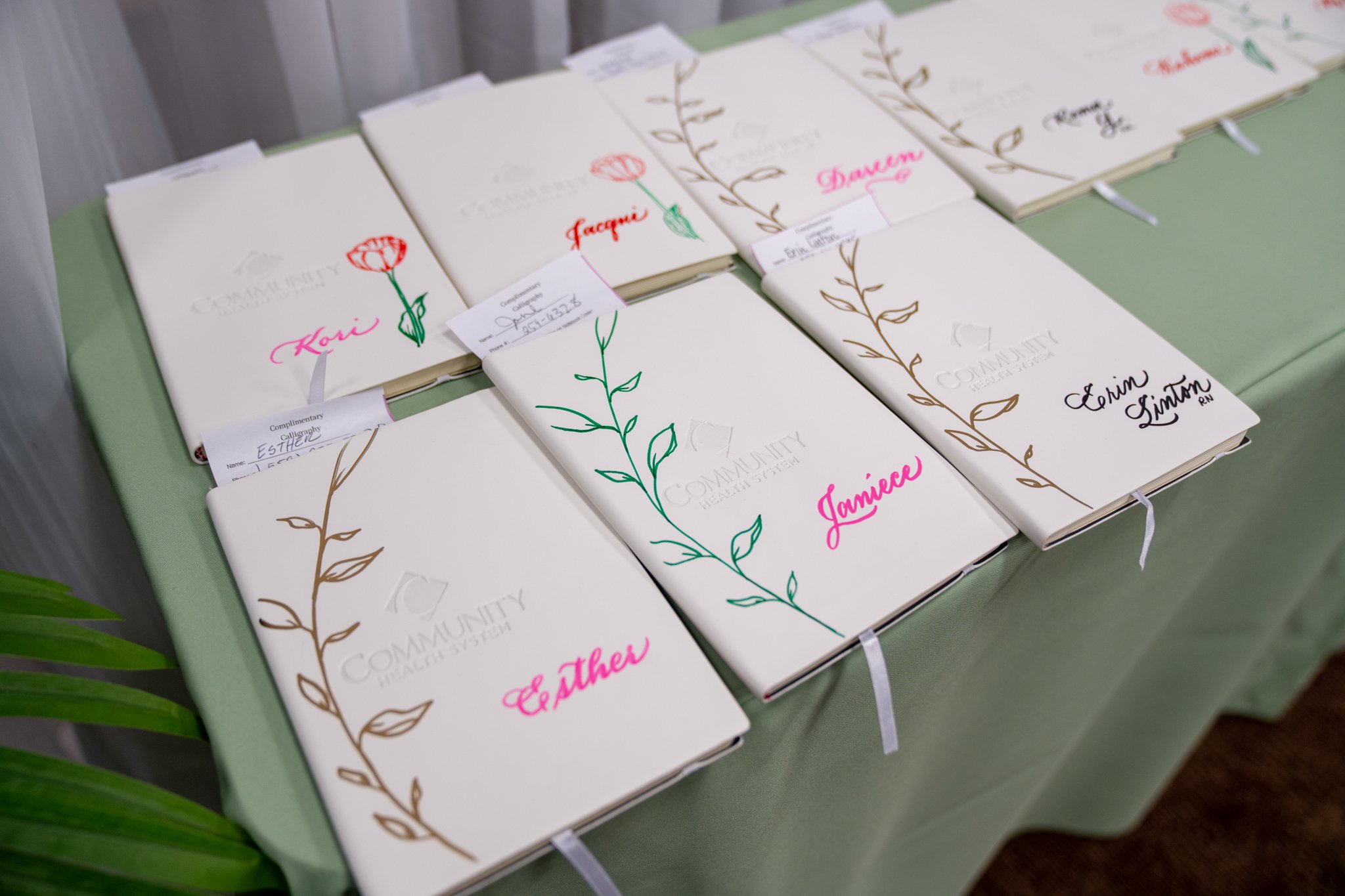 Hand-lettered notebooks for corporate event in Central California