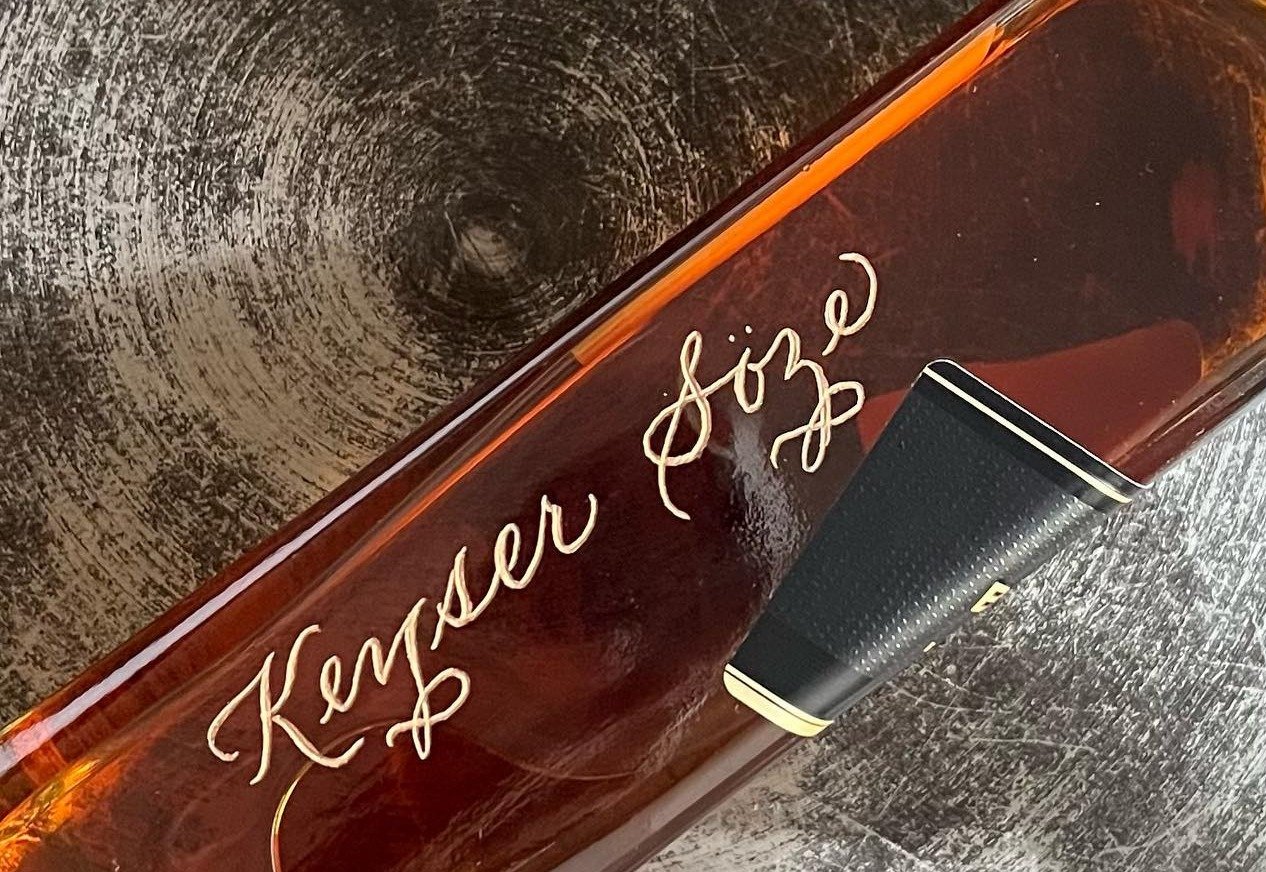 Pair of engraved liquor bottles featuring branded designs for a California brand activation.