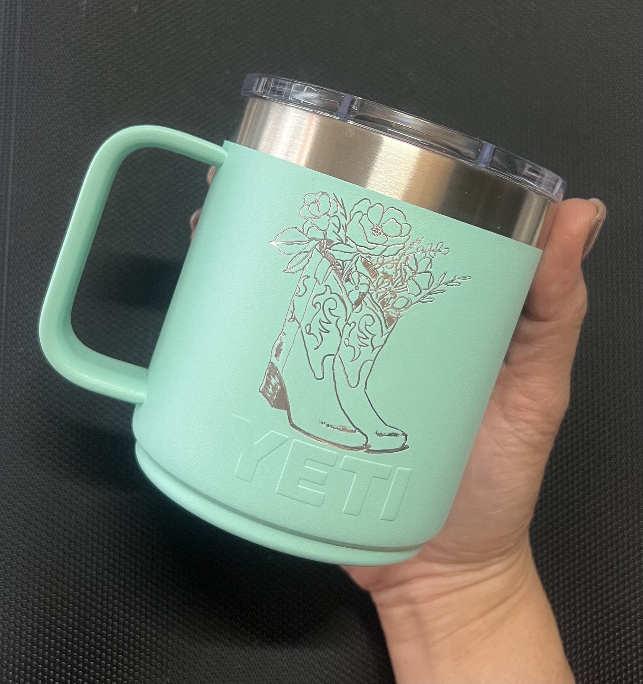 Sample engraved mugs showcasing hand personalization at California events