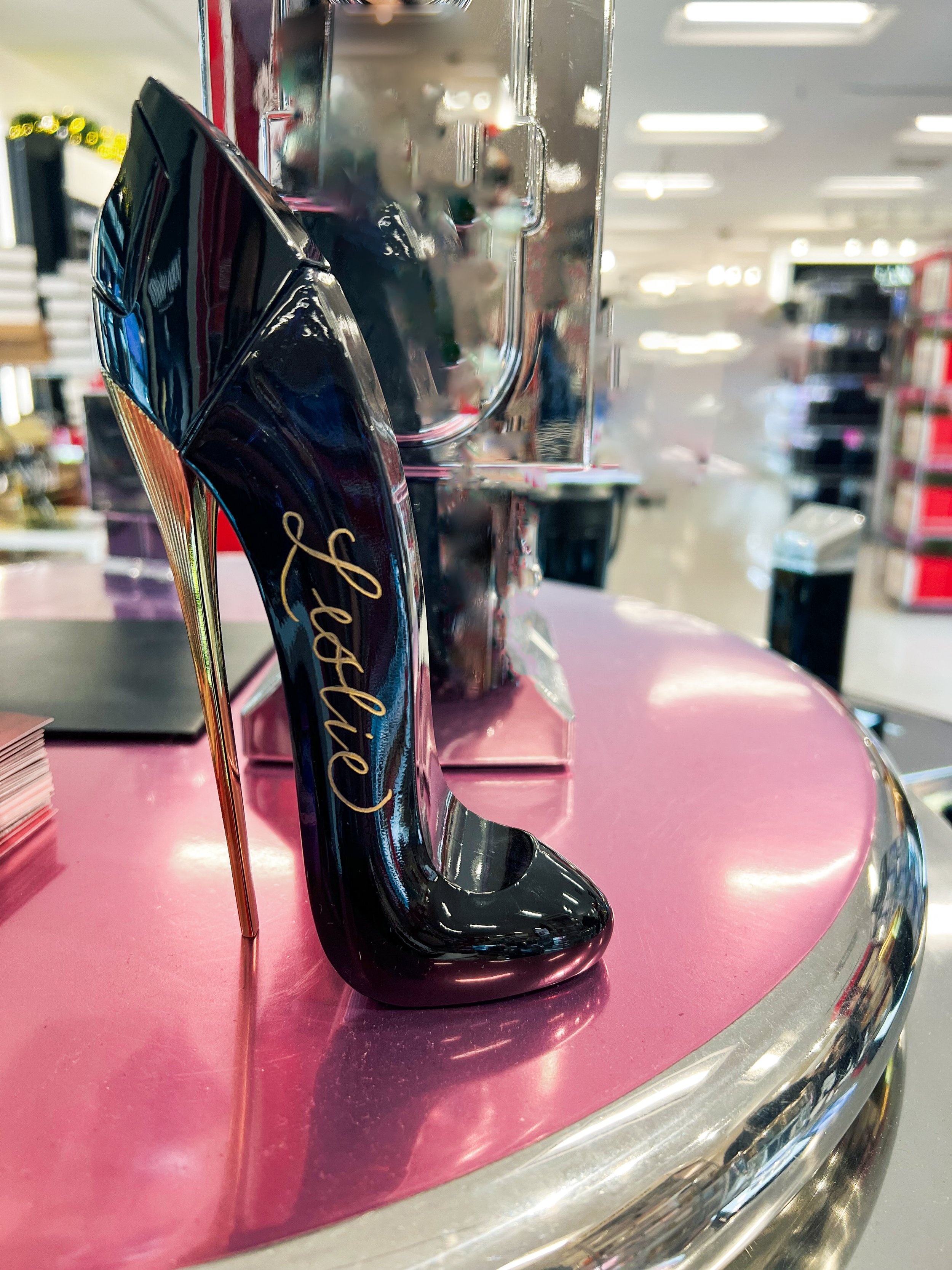 Custom engraved perfume bottle created for a luxury gifting experience at a live event.