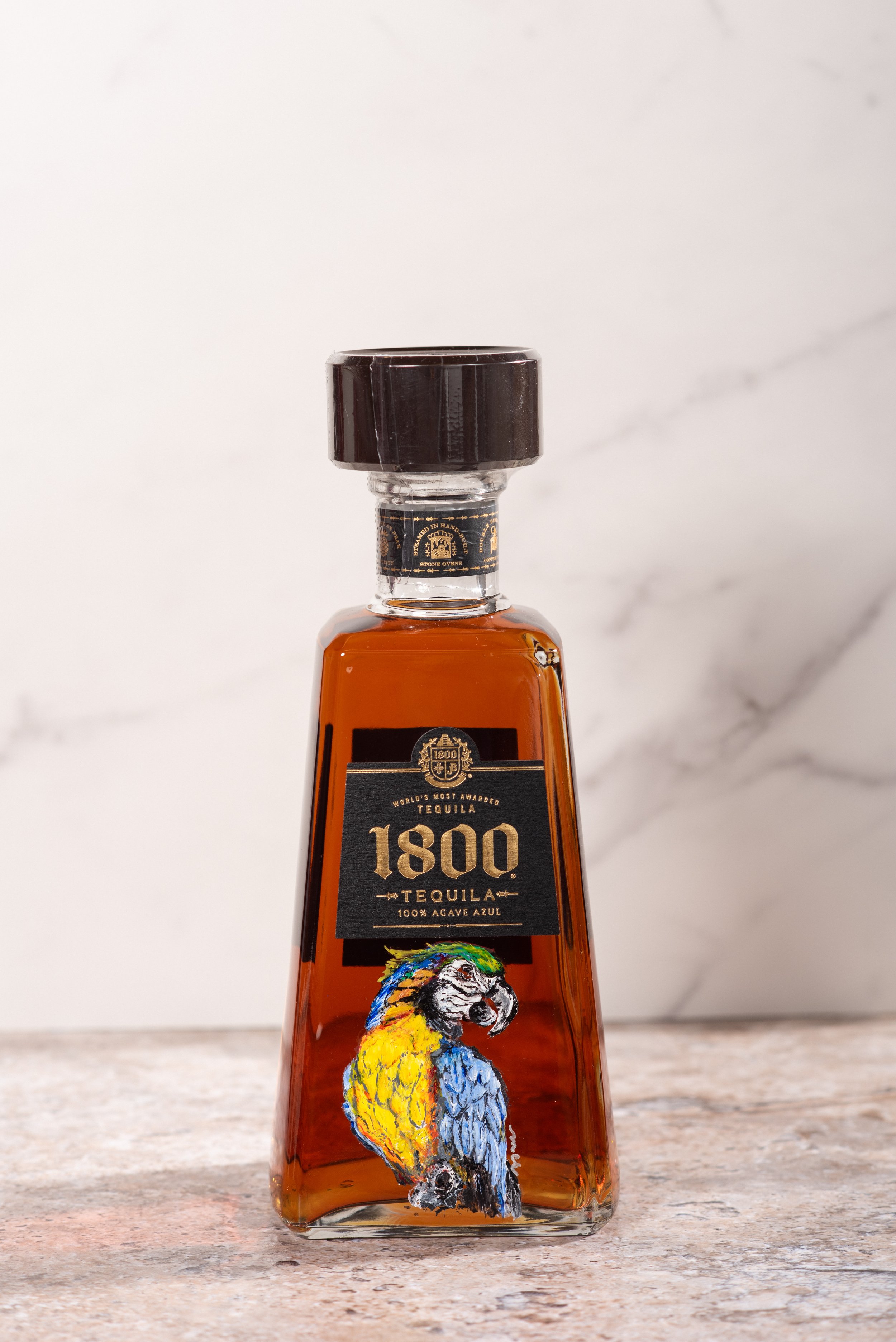 Sample engraved liquor bottles showcasing hand personalization at California events