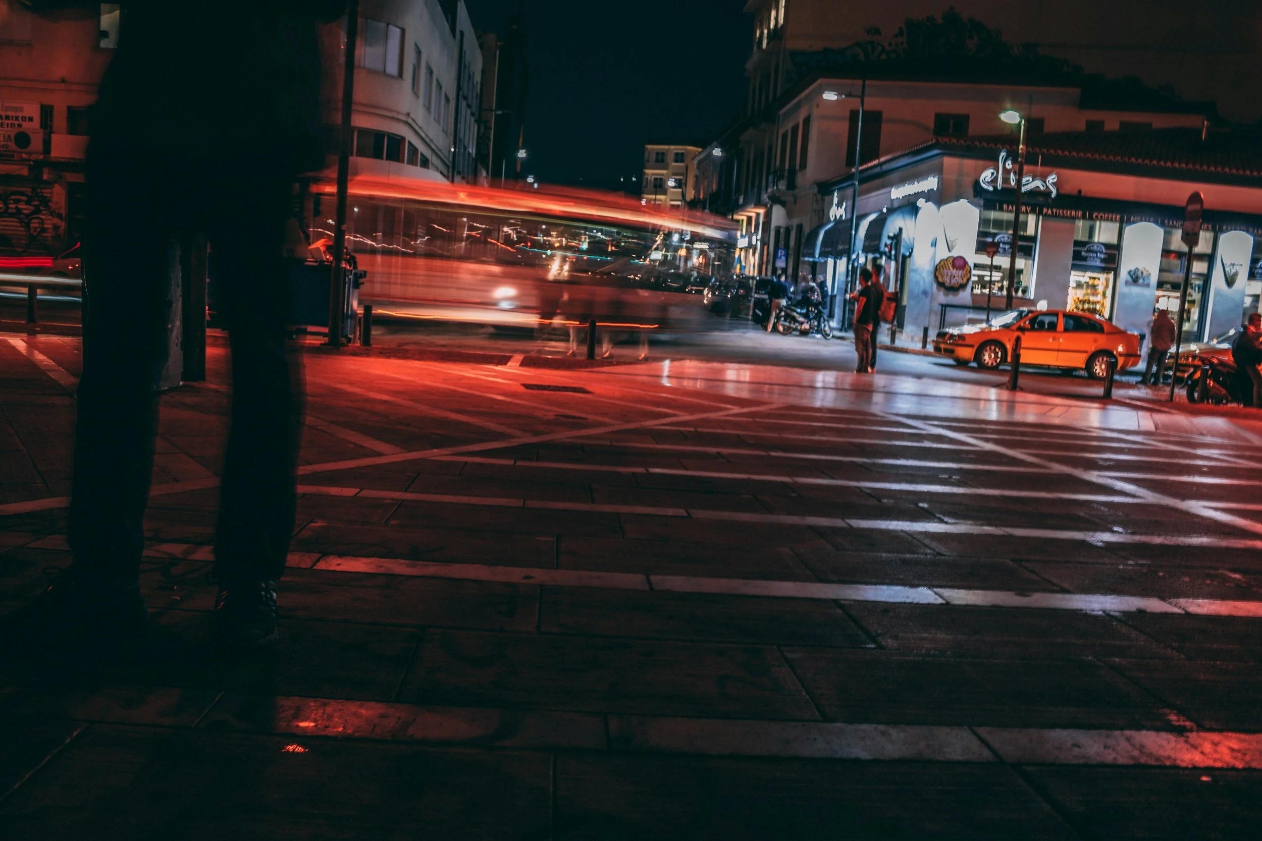 Athens city street illuminated at night during private evening tour