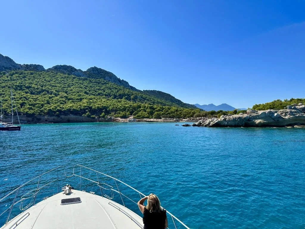 Private motor yacht approaching blue waters near the Saronic Islands