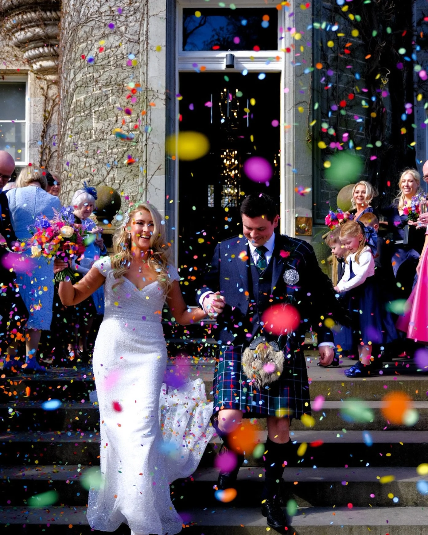 First confetti throw of the year and it was a banger!! Congrats  Lynne and Scott. It was lovely seeing you become a family! #wedding #scottishwedding #weddingphotography @andrewdscottcelebrant @carlowrie_castle @citybrides @vickys__flowers @nextscene