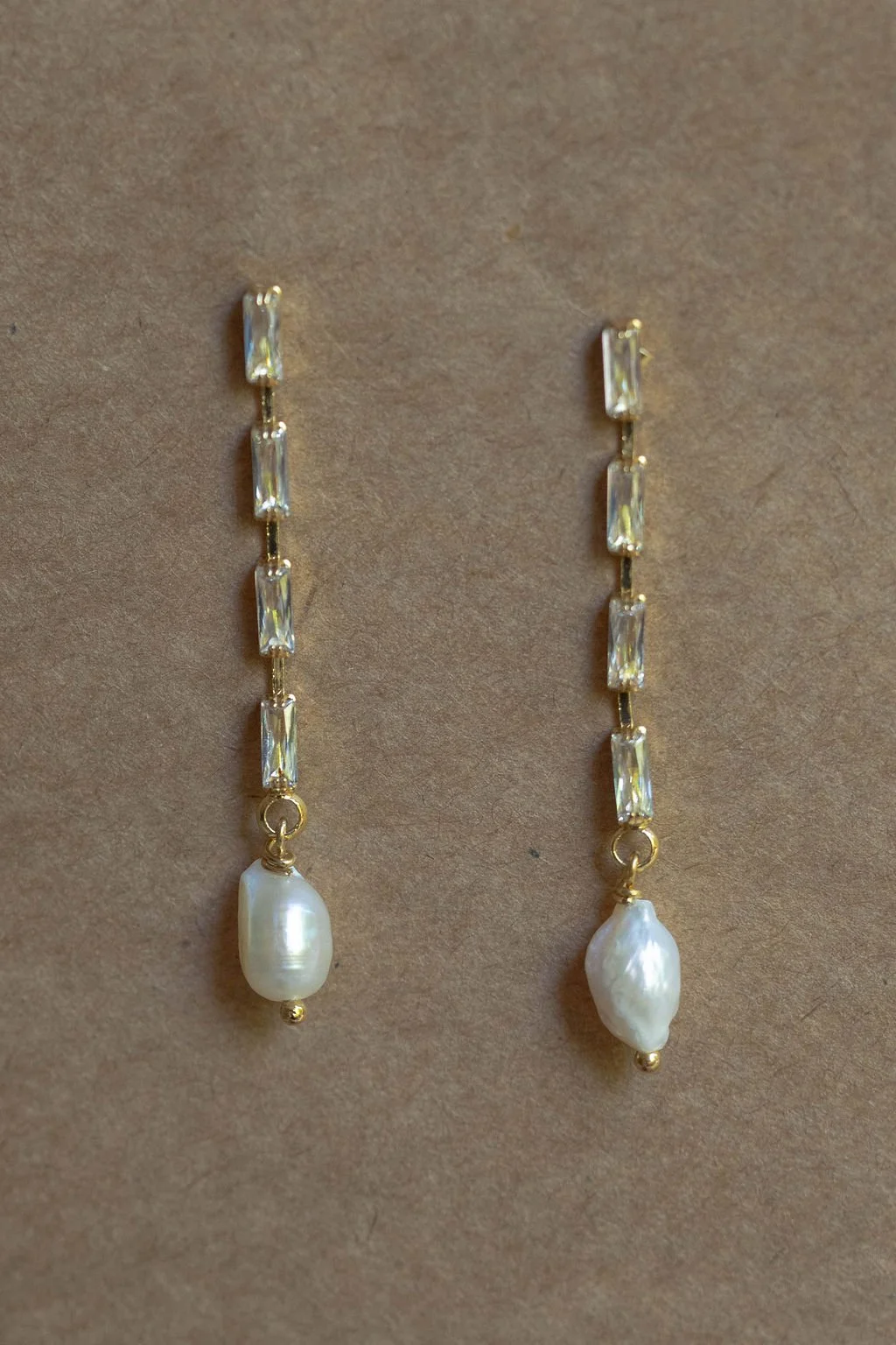 sarah-fekir-delicate-pearl-earrings.jpg