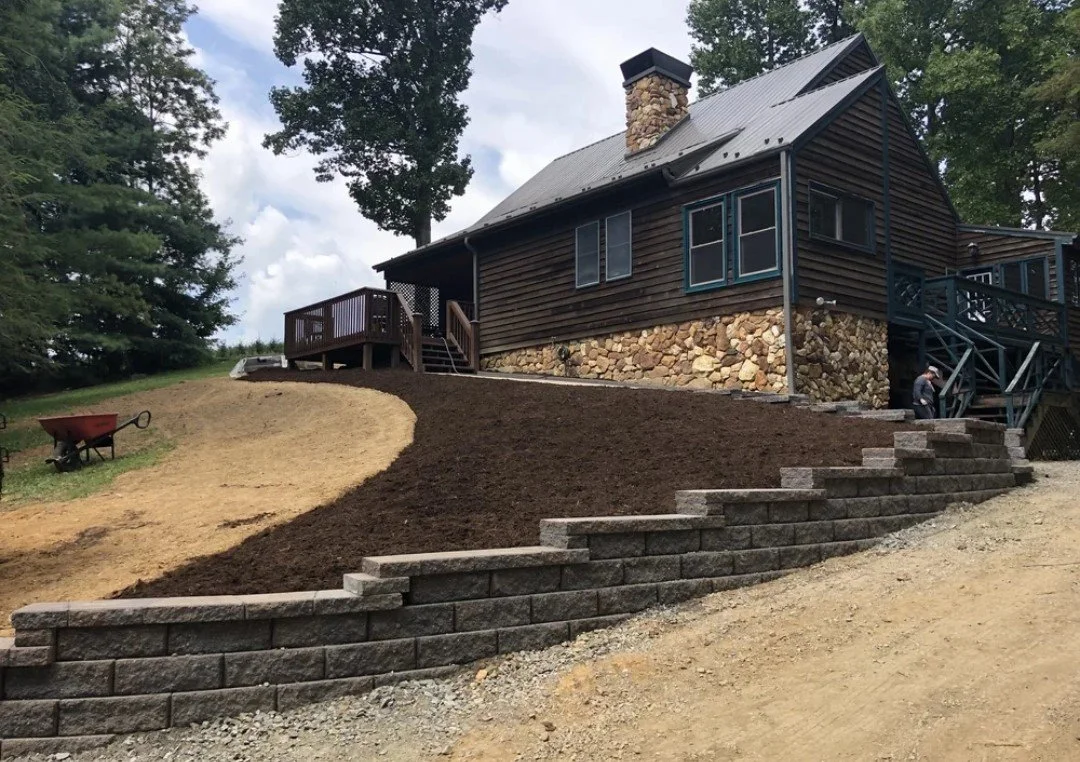 Benefits of Retaining Walls for Sloped Properties